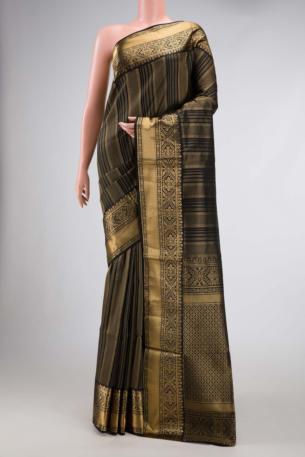Black Dual Tone Soft Silk Saree with Stripes on the body and Zari Border.  displayed on a mannequin