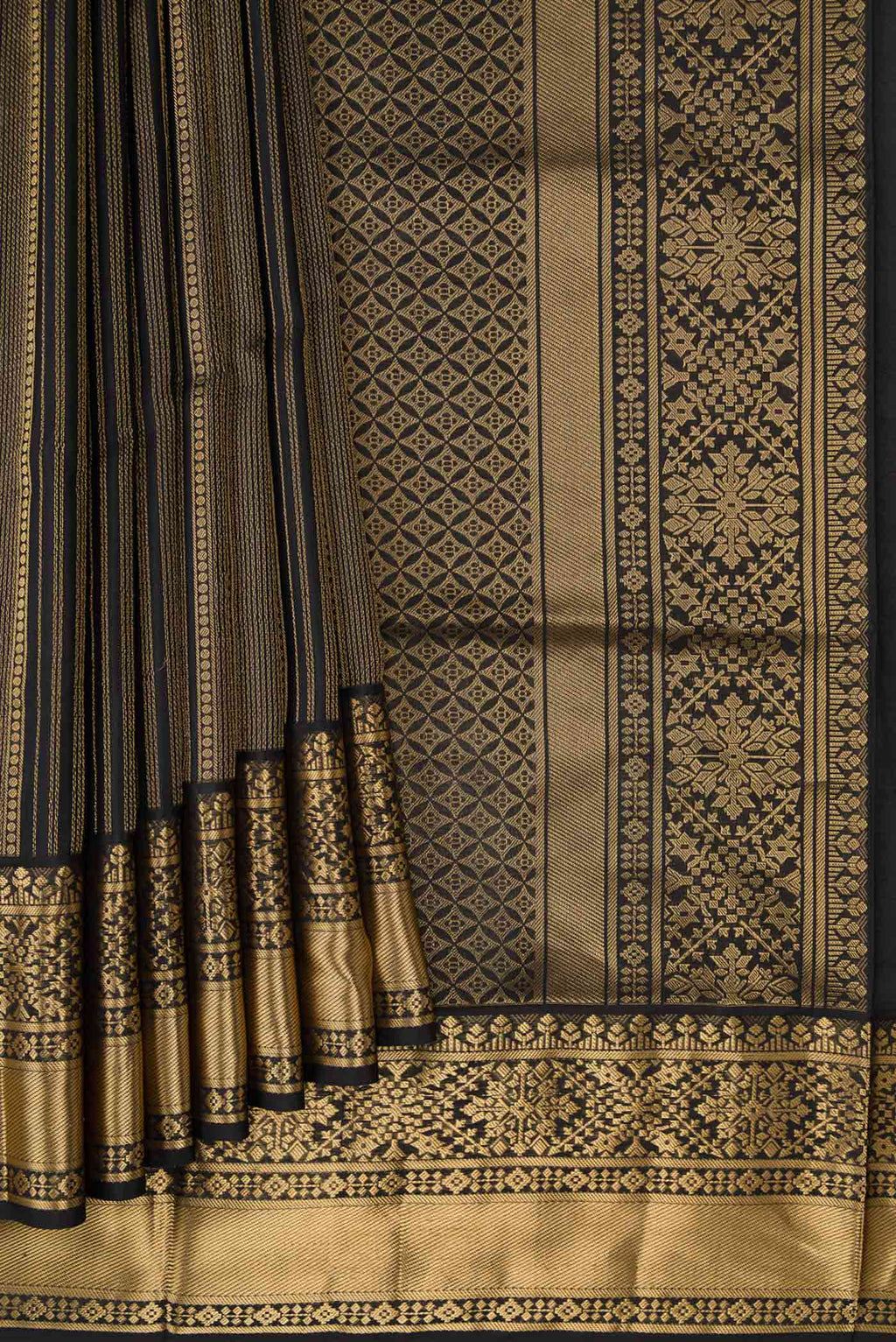 Pleats and pallu of Black Dual Tone Soft Silk Saree with Stripes on the body and Zari Border. 