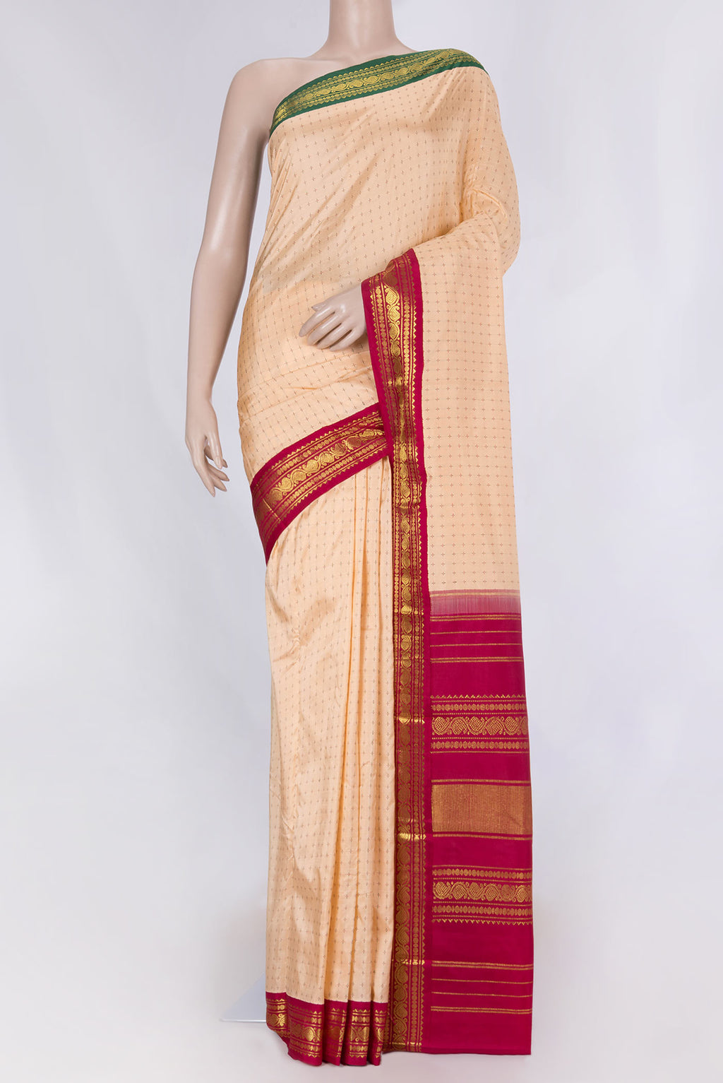 Golden Peach Dual Tone Kanchipuram Silk Saree with Checked design on the body and Ganga Jamuna Border displayed on a mannequin
