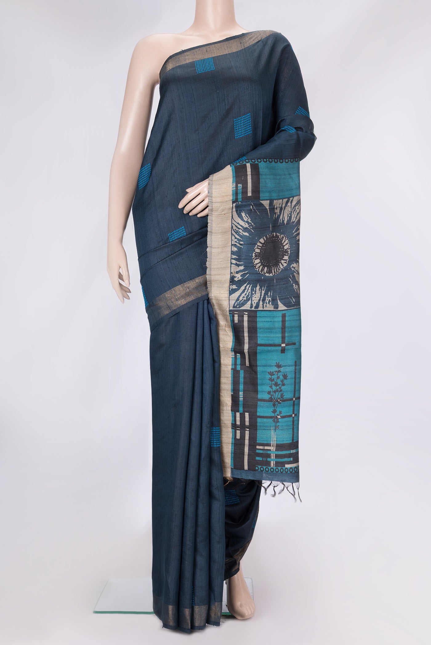 Peacock Blue Dual Tone Tussar Silk Saree with Thread Butta on the body and Zari Border.  displayed on a mannequin