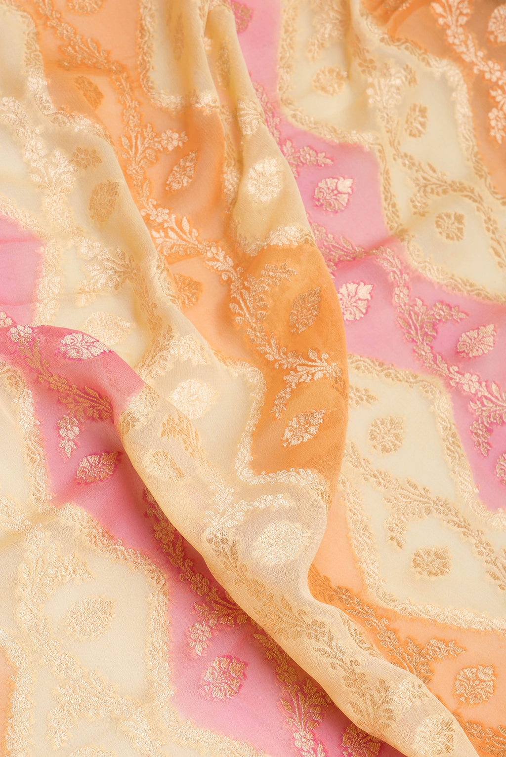 Close up of Multi Color Banarasi Georgette Saree with Zari Brocade on the body and Zari Border.  displaying folds
