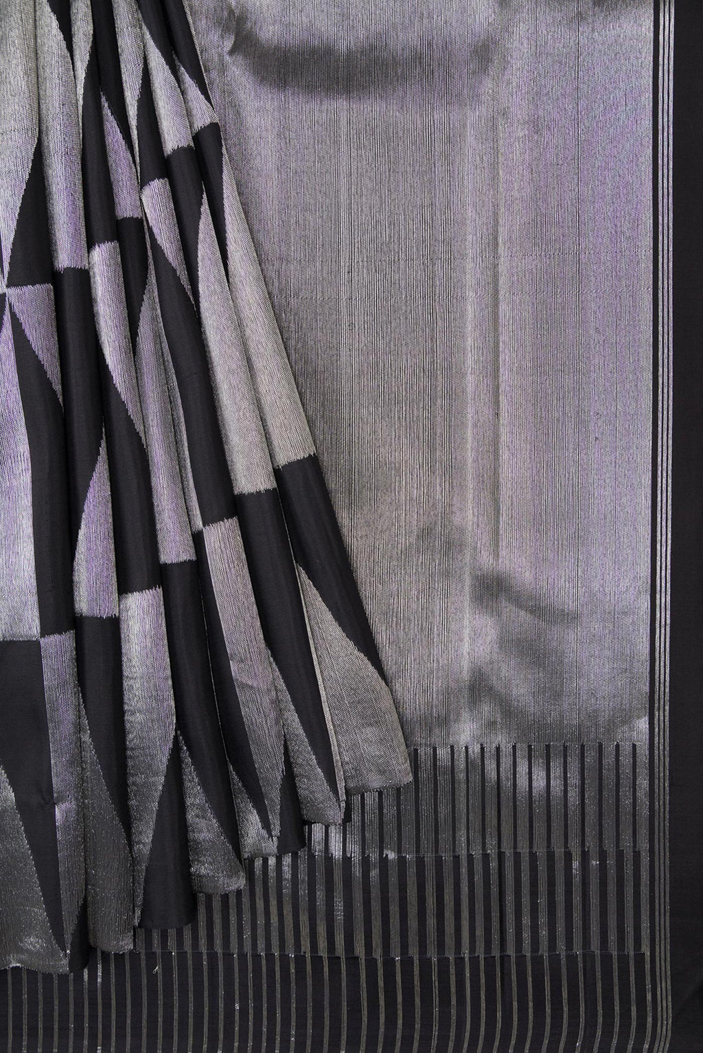 Pleats and pallu of Black Dual Tone Kanchipuram Tissue Silk Saree with Zari Brocade on the body and Without Border. 