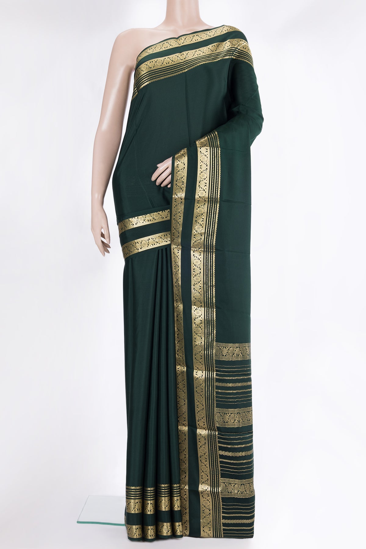 Bottle Green Mysore Chiffon Saree with Plain Body and Zari Border.  displayed on a mannequin