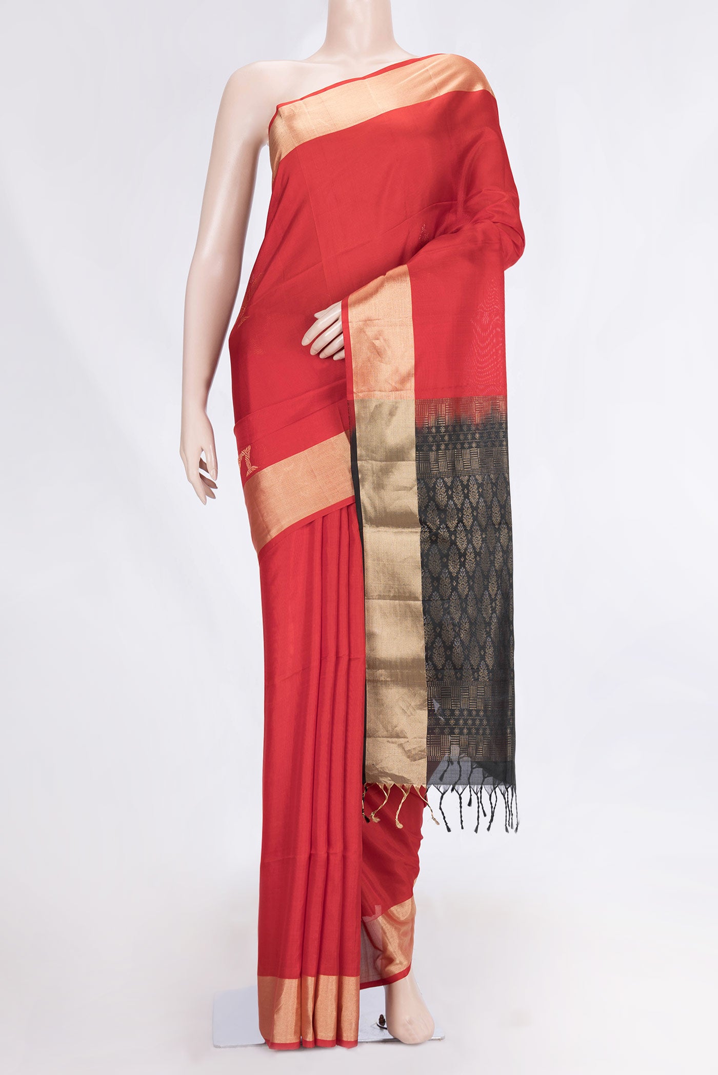 Red Dual Tone Soft Silk Saree with Zari Butta on the body and Zari Border.  displayed on a mannequin