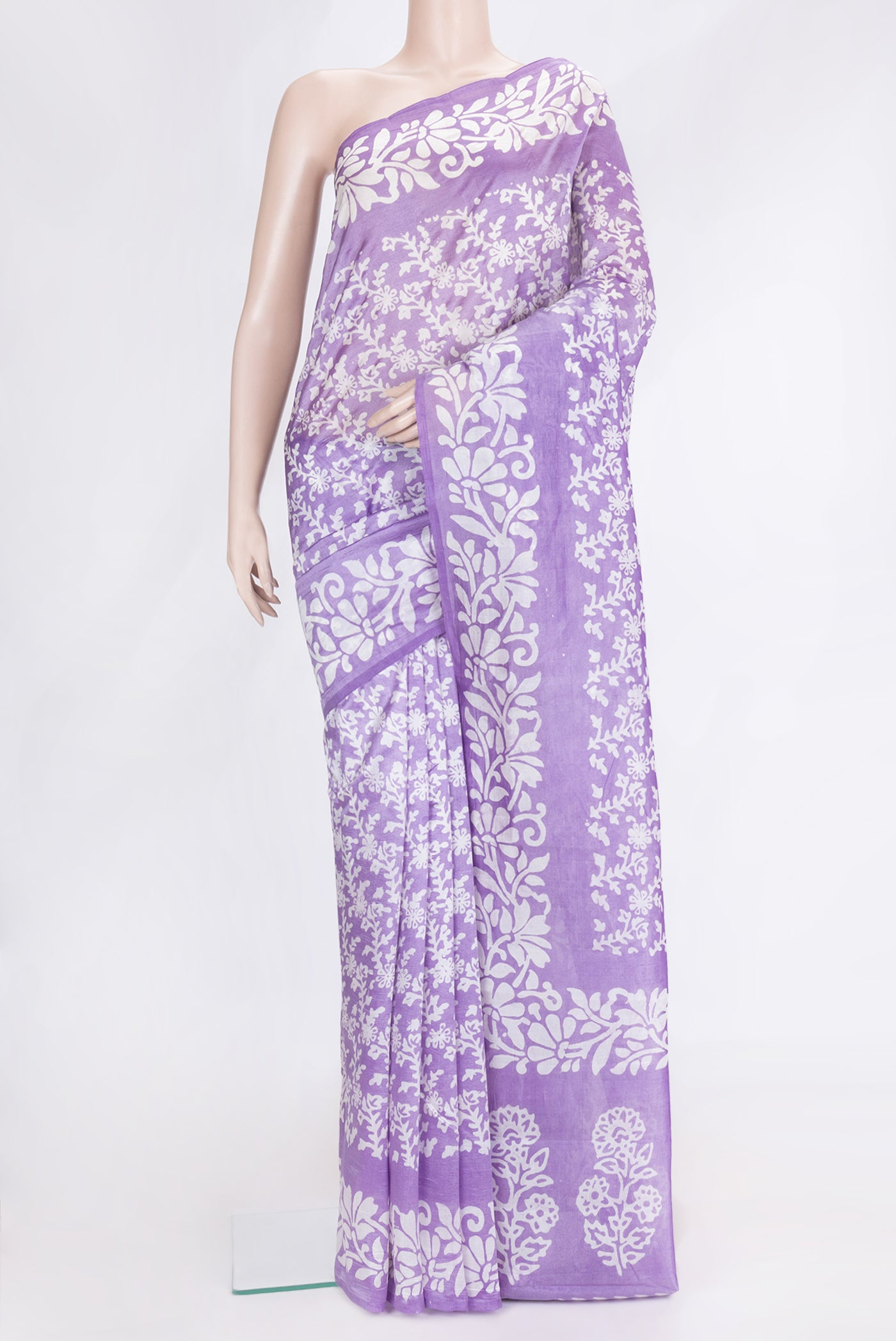 Lavender Dual Tone Tussar Silk Saree with Printed design on the body and Printed Border.  displayed on a mannequin
