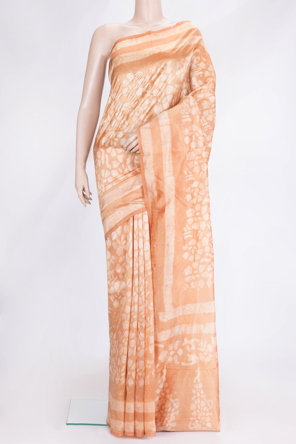 Sandal Dual Tone Tussar Silk Saree with Printed design on the body and Printed Border.  displayed on a mannequin