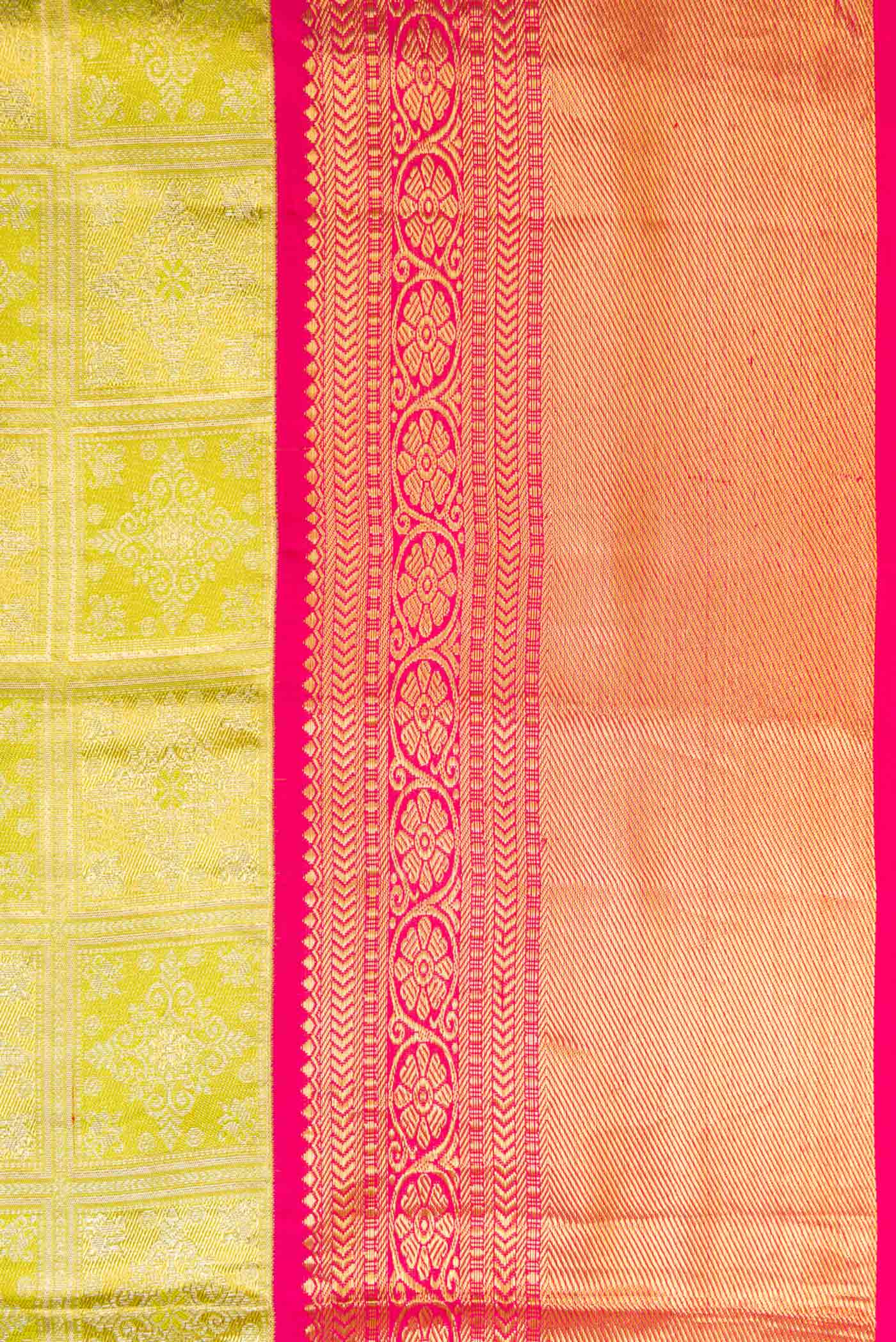 Border image of Pista Green Dual Tone Kanjivaram Tissue Silk Saree with Zari Brocade on the body and Zari Border. 