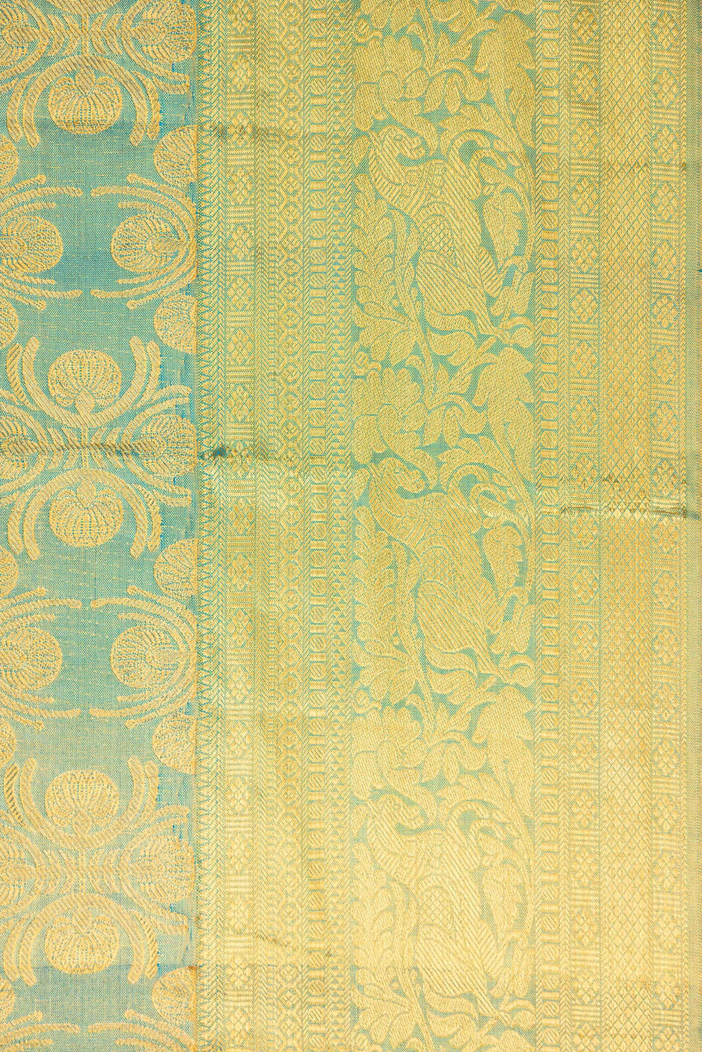 Border image of Sky Blue Dual Tone Kanchipuram Tissue Silk Saree with Zari Brocade on the body and Zari Border. 
