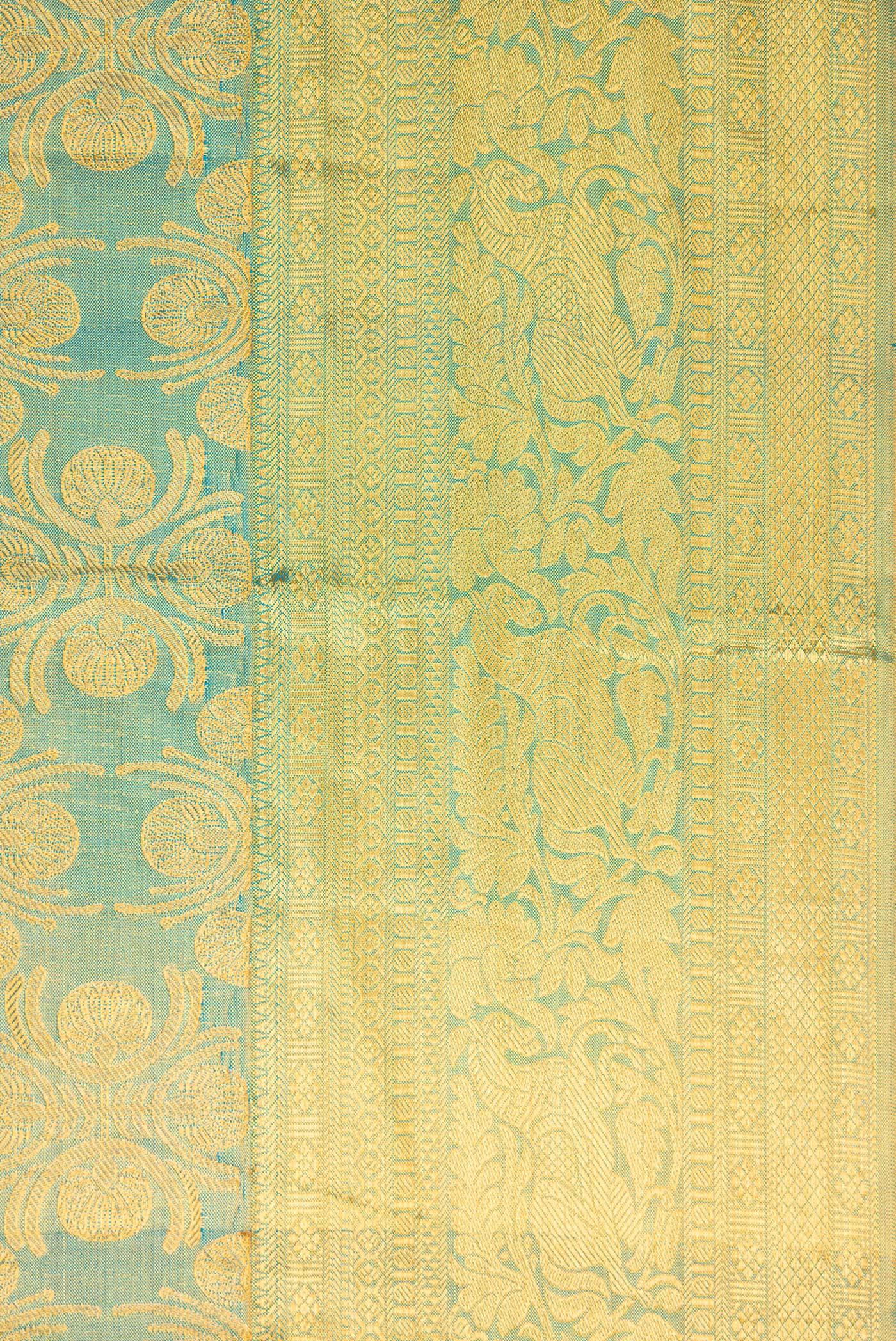 Border image of Sky Blue Dual Tone Kanchipuram Tissue Silk Saree with Zari Brocade on the body and Zari Border. 