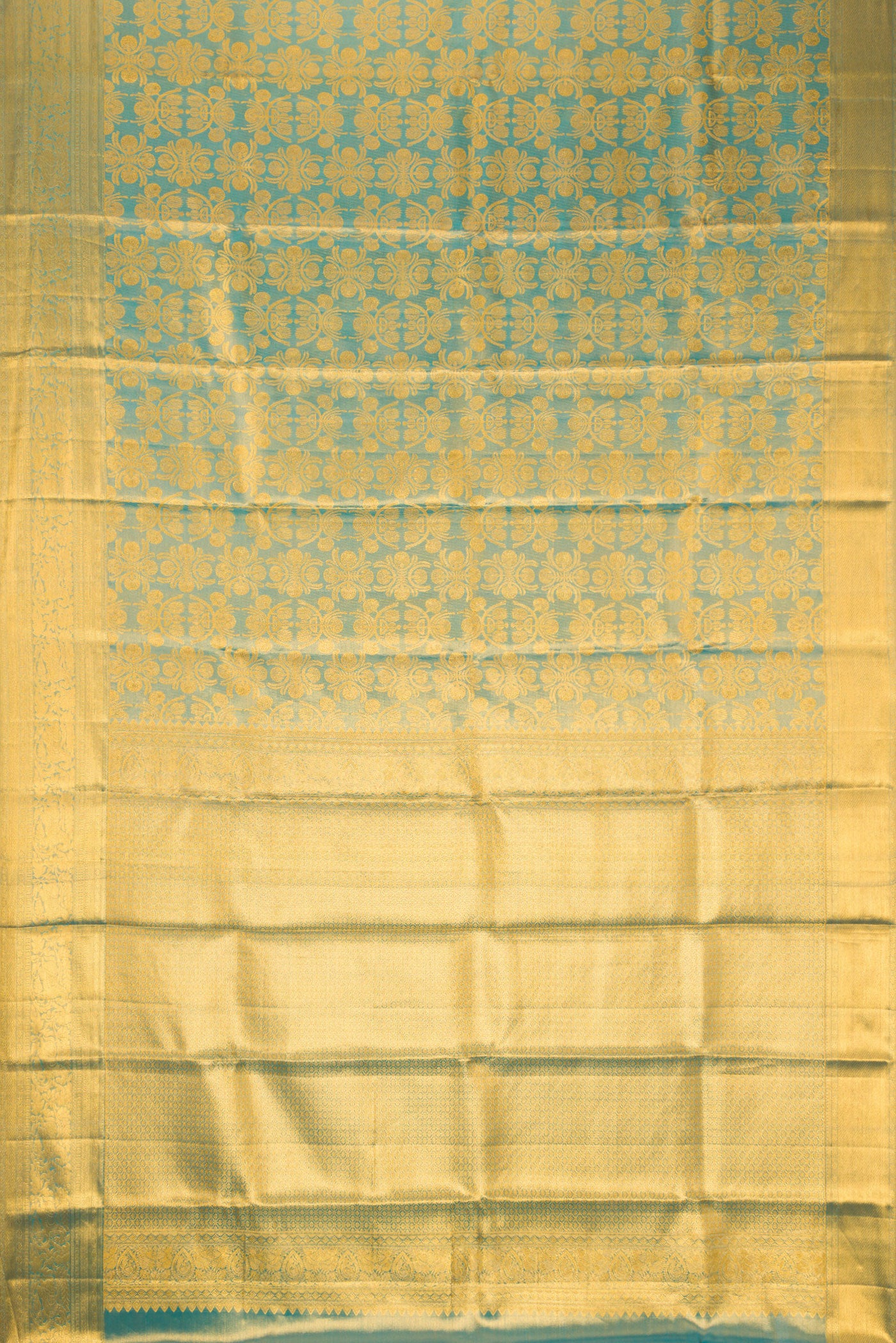 Flat view of Sky Blue Dual Tone Kanchipuram Tissue Silk Saree with Zari Brocade on the body and Zari Border. 