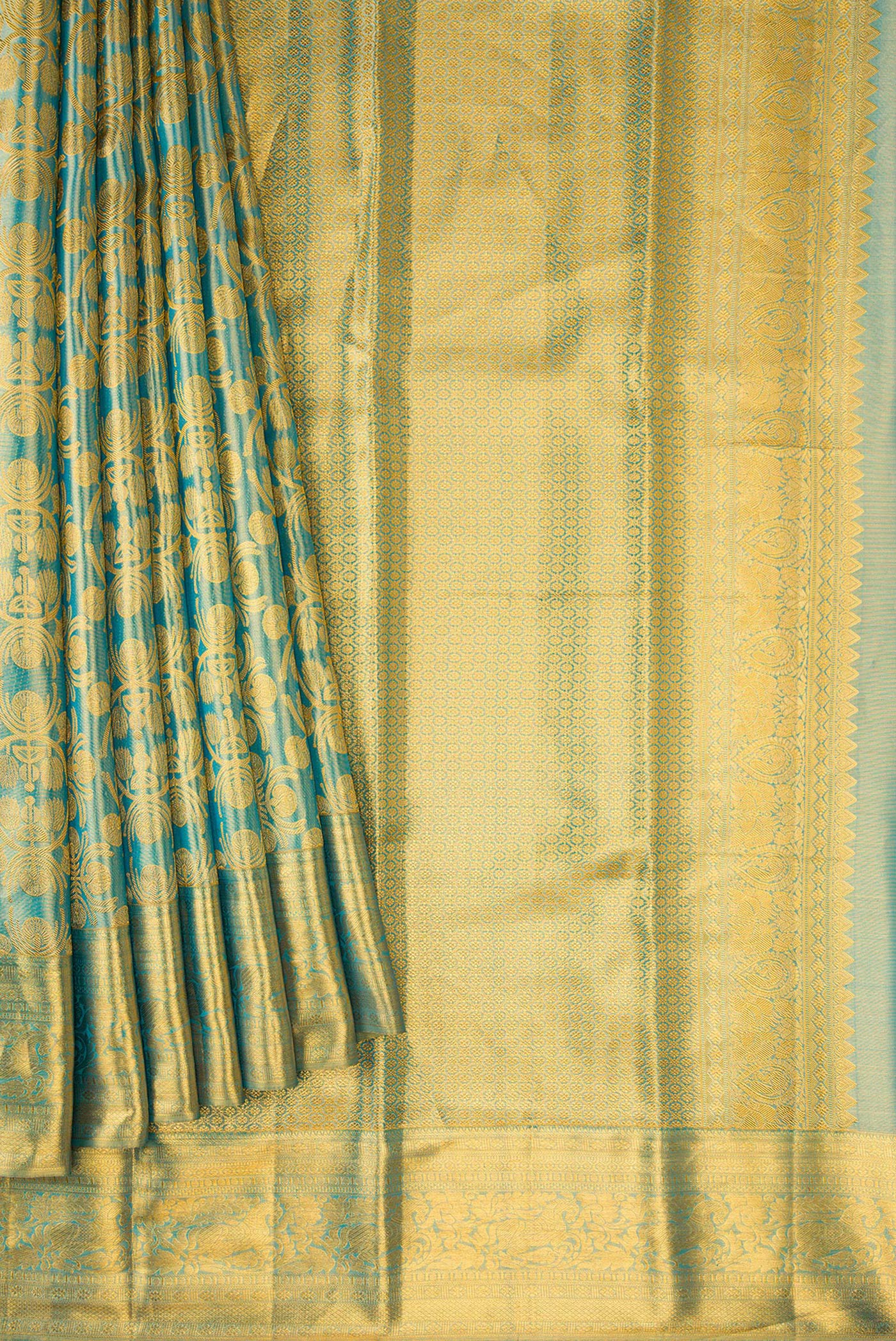 Pleats and pallu of Sky Blue Dual Tone Kanchipuram Tissue Silk Saree with Zari Brocade on the body and Zari Border. 
