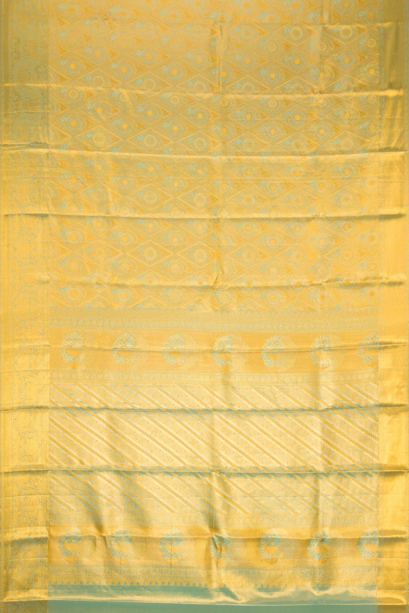 Flat view of Gold Dual Tone Kanchipuram Tissue Silk Saree with Zari Brocade on the body and Zari Border. 