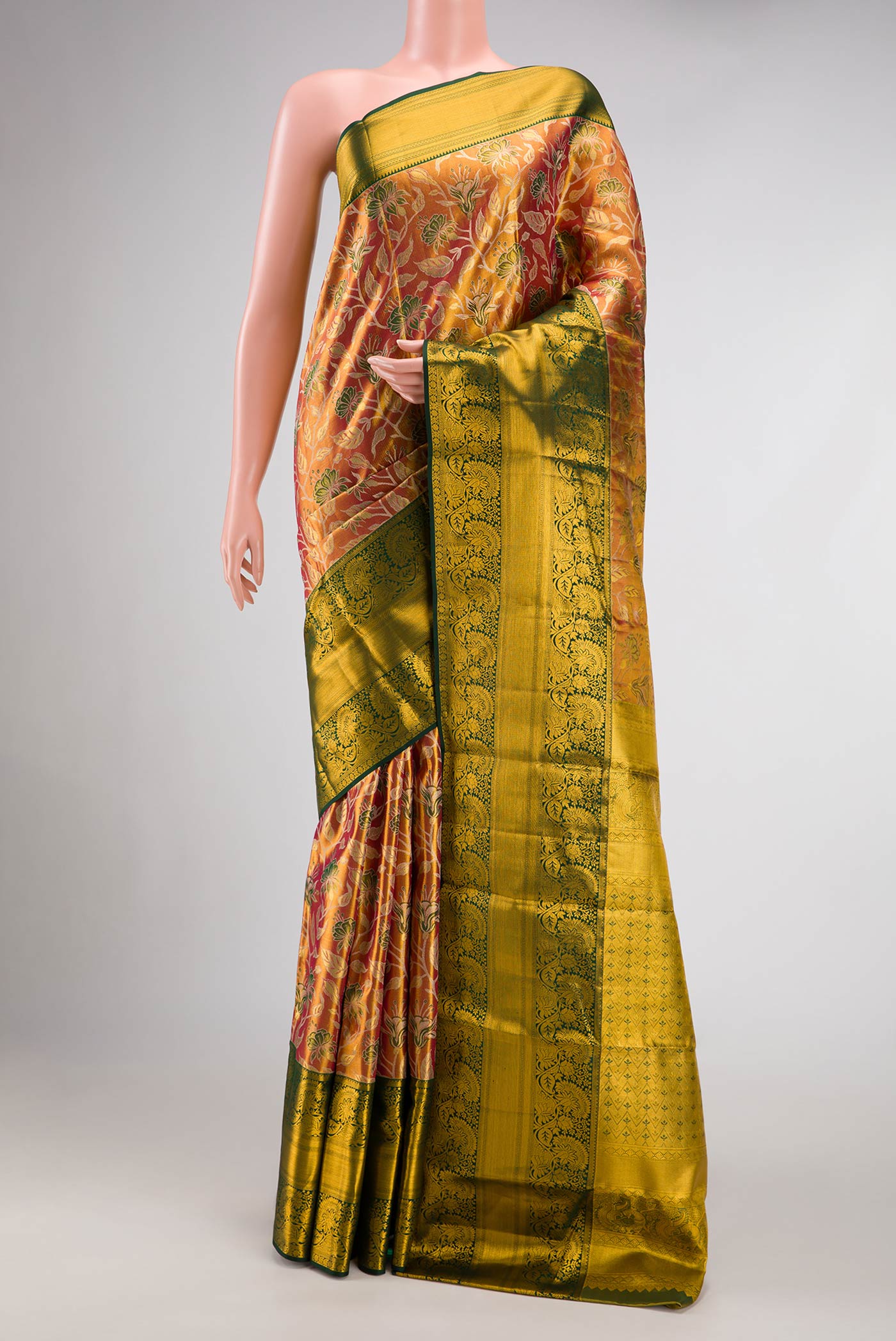 Gold Dual Tone Kanchipuram Tissue Silk Saree with Zari Brocade on the body and Zari Border.  displayed on a mannequin