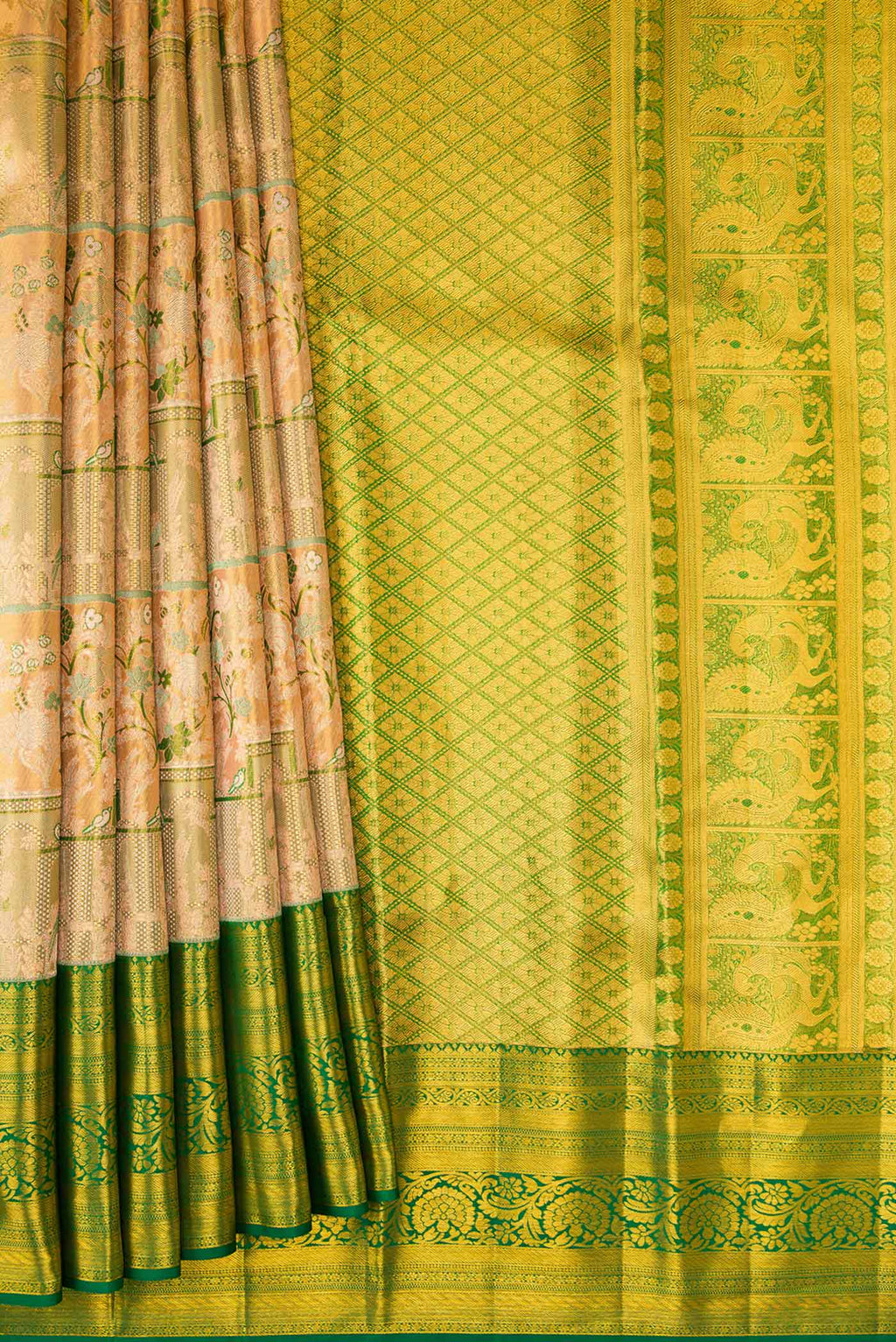Pleats and pallu of Peach Dual Tone Kanchipuram Tissue Silk Saree with Zari Brocade on the body and Zari Border. 