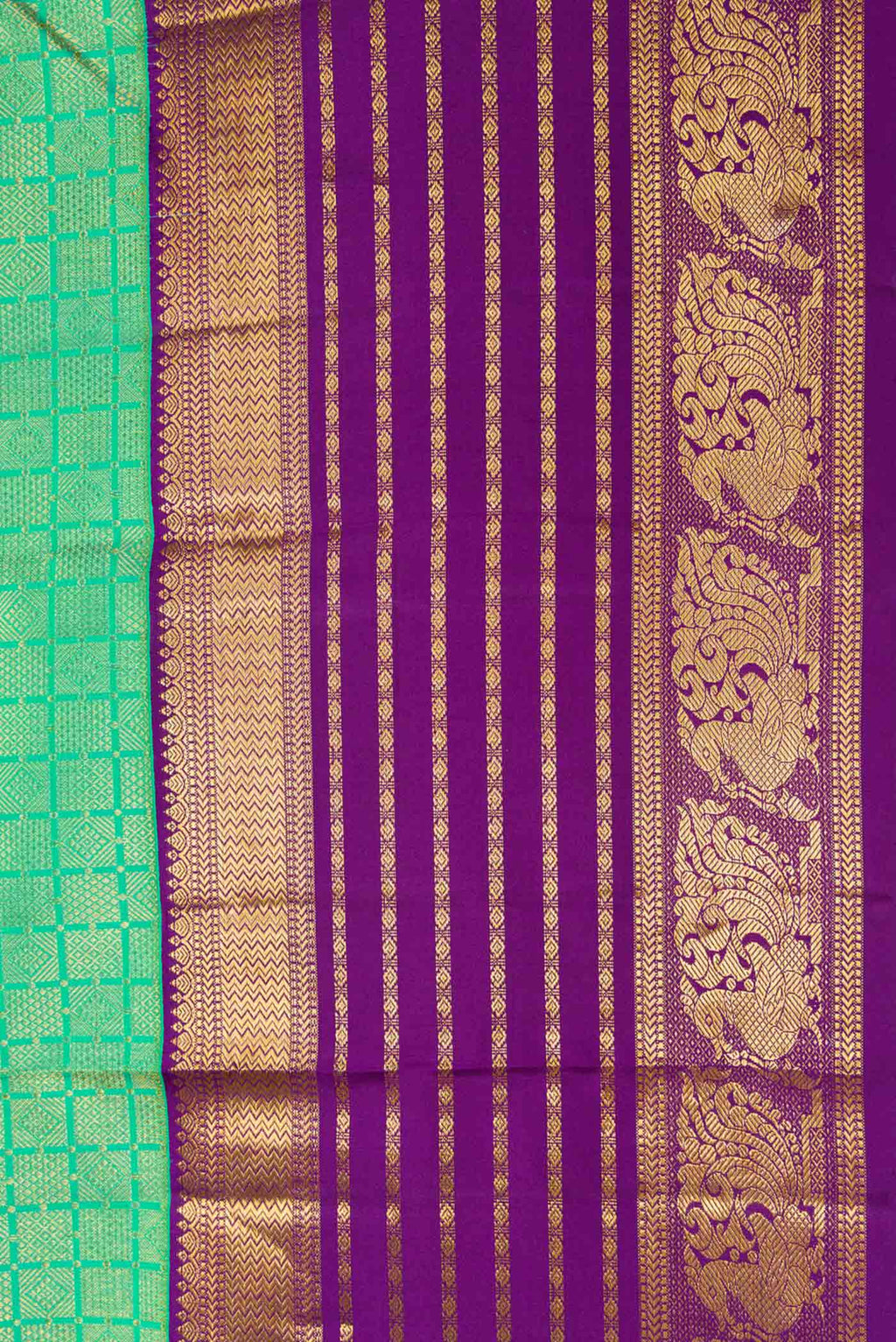 Border image of Green Dual Tone Kanjivaram Silk Saree with Zari Brocade on the body and Zari Border. 