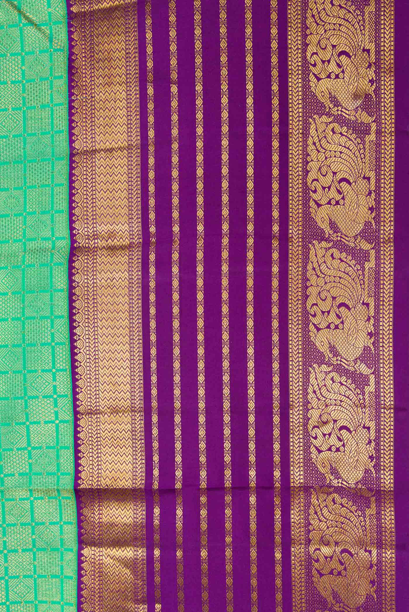 Border image of Green Dual Tone Kanjivaram Silk Saree with Zari Brocade on the body and Zari Border. 