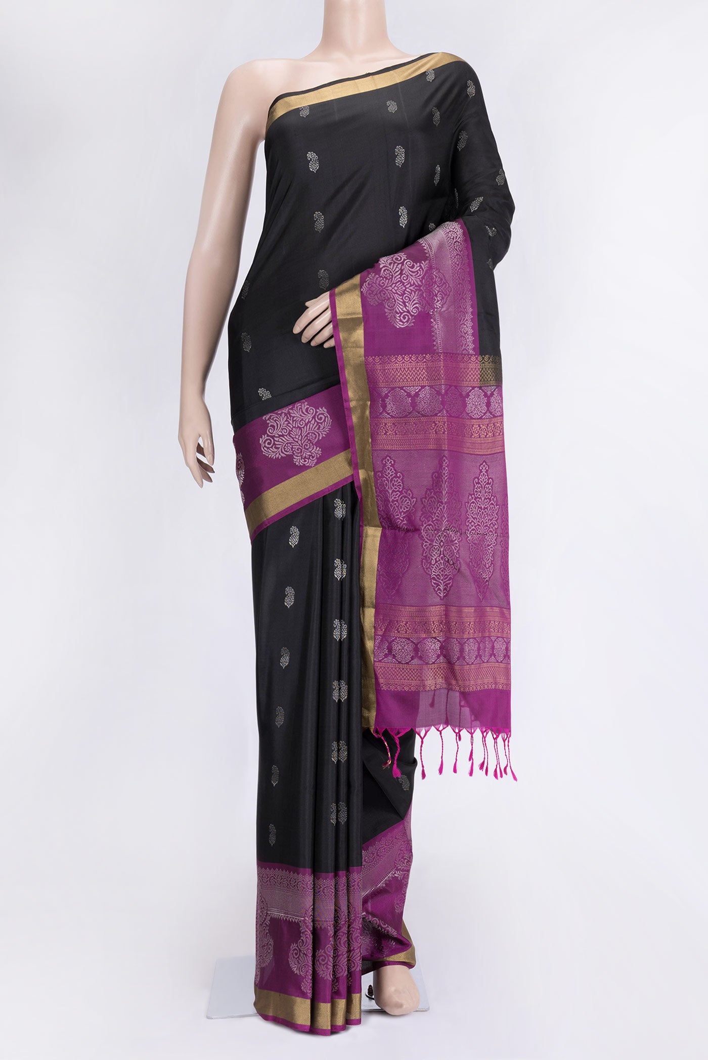 Black Dual Tone Soft Silk Saree with Zari Butta on the body and Zari Border.  displayed on a mannequin