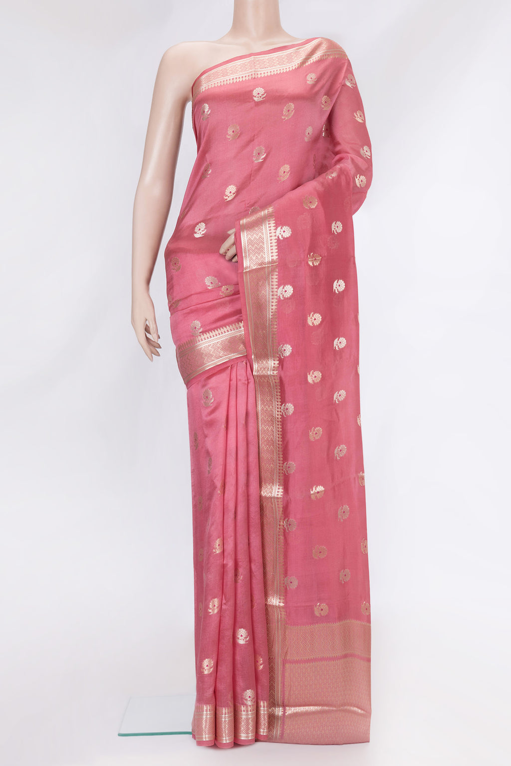 Rose Gold and Peach Dual Tone Banarasi Raw Silk Saree with Zari Butta on the body and Zari Border.  displayed on a mannequin