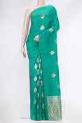 Green Dual Tone Banarasi Raw Silk Saree with Zari Butta on the body and Without Border.  displayed on a mannequin