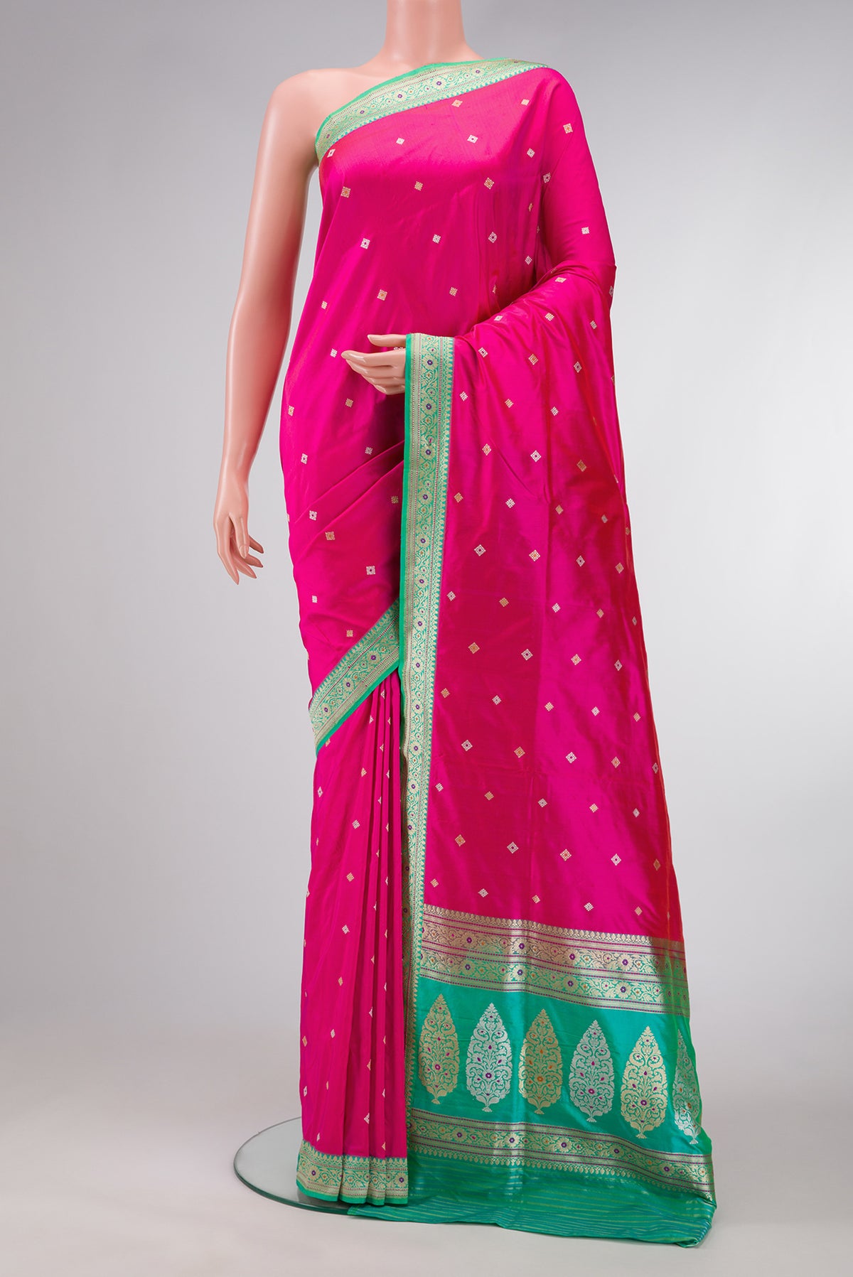 Pink Dual Tone Banarasi Silk Saree with Zari Butta on the body and Zari Border.  displayed on a mannequin