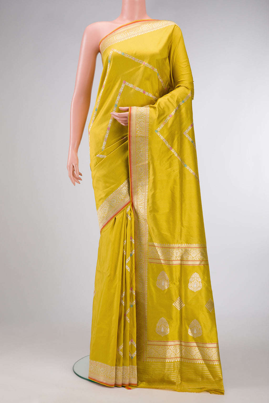 Mehandi Green Dual Tone Banarasi Silk Saree with Zari Butta on the body and Zari Border.  displayed on a mannequin