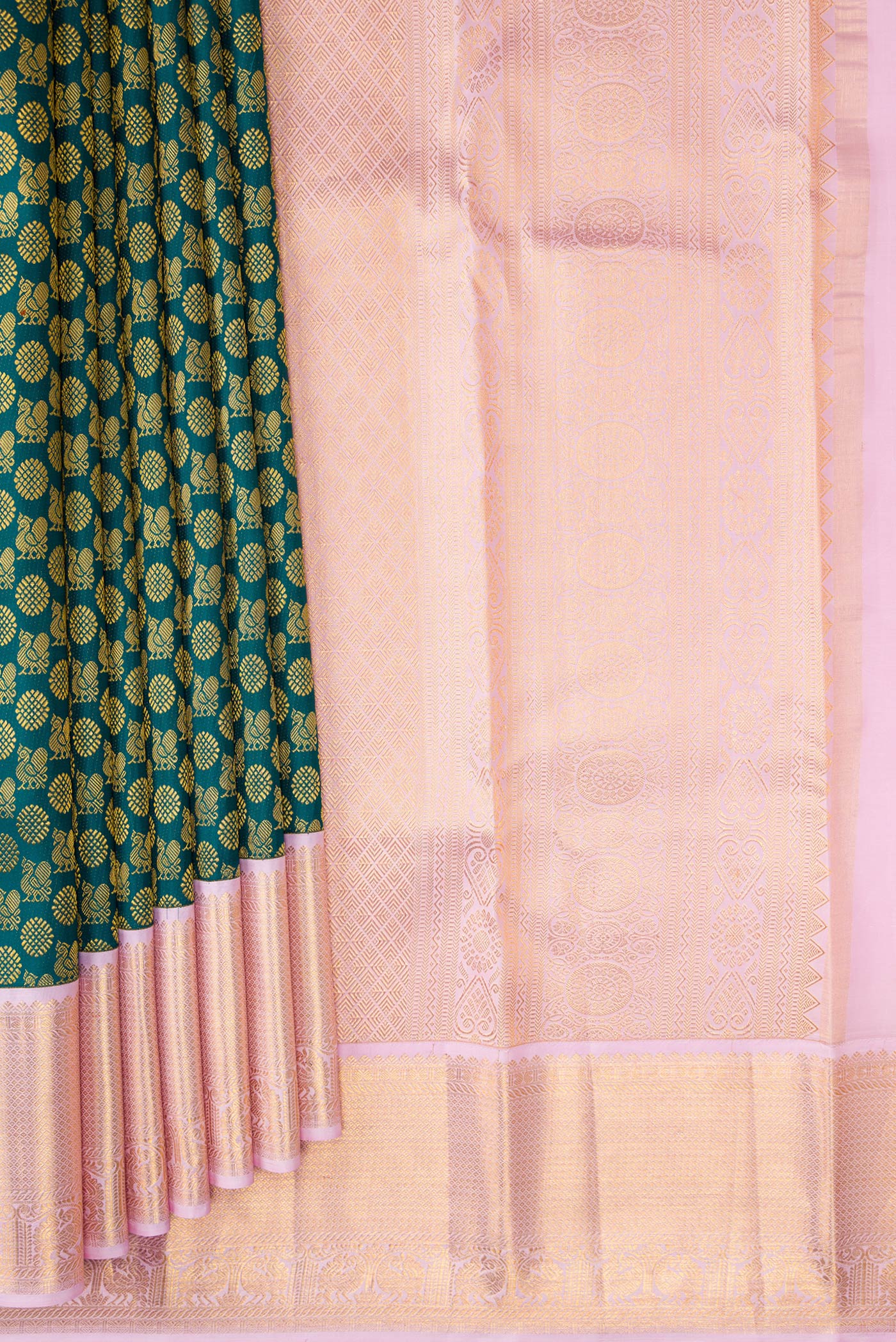 Pleats and pallu of Bottle Green Dual Tone Kanchipuram Silk Saree with Zari Brocade on the body and Zari Border. 