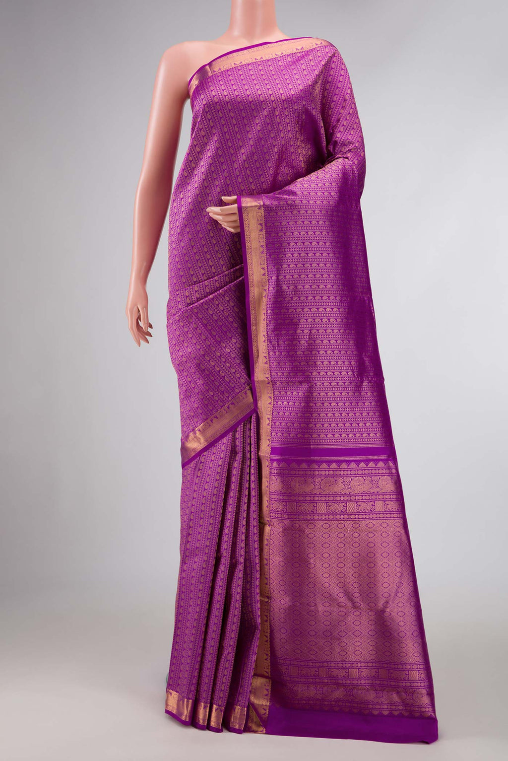Purple Dual Tone Kanchipuram Silk Saree with Zari Brocade on the body and Zari Border displayed on a mannequin