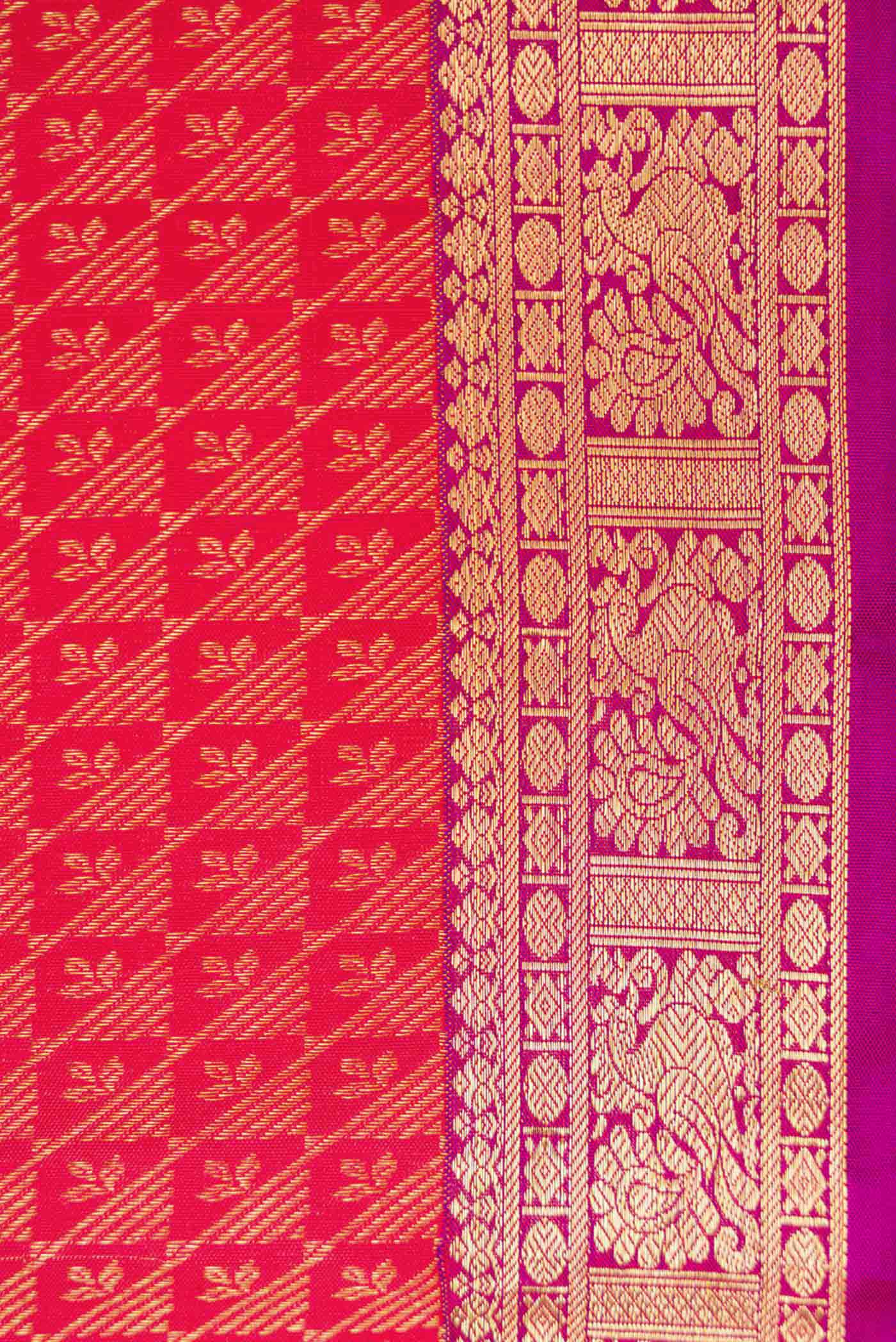 Border image of Pink Dual Tone Kanjivaram Silk Saree with Zari Brocade on the body and Zari Border. 
