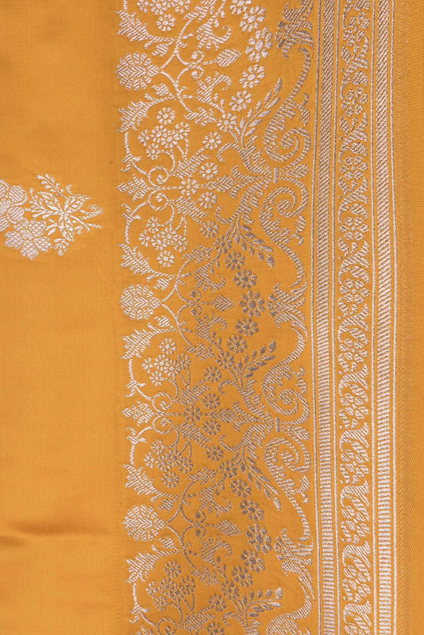 Border image of Yellow Dual Tone Banarasi Silk Saree with Zari Butta on the body and Zari Border. 