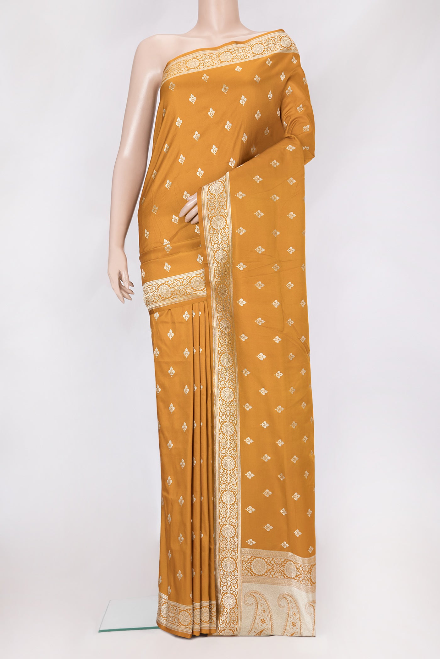 Mustard Blended Banarasi Silk Saree with Zari Butta on the body and Zari Border.  displayed on a mannequin