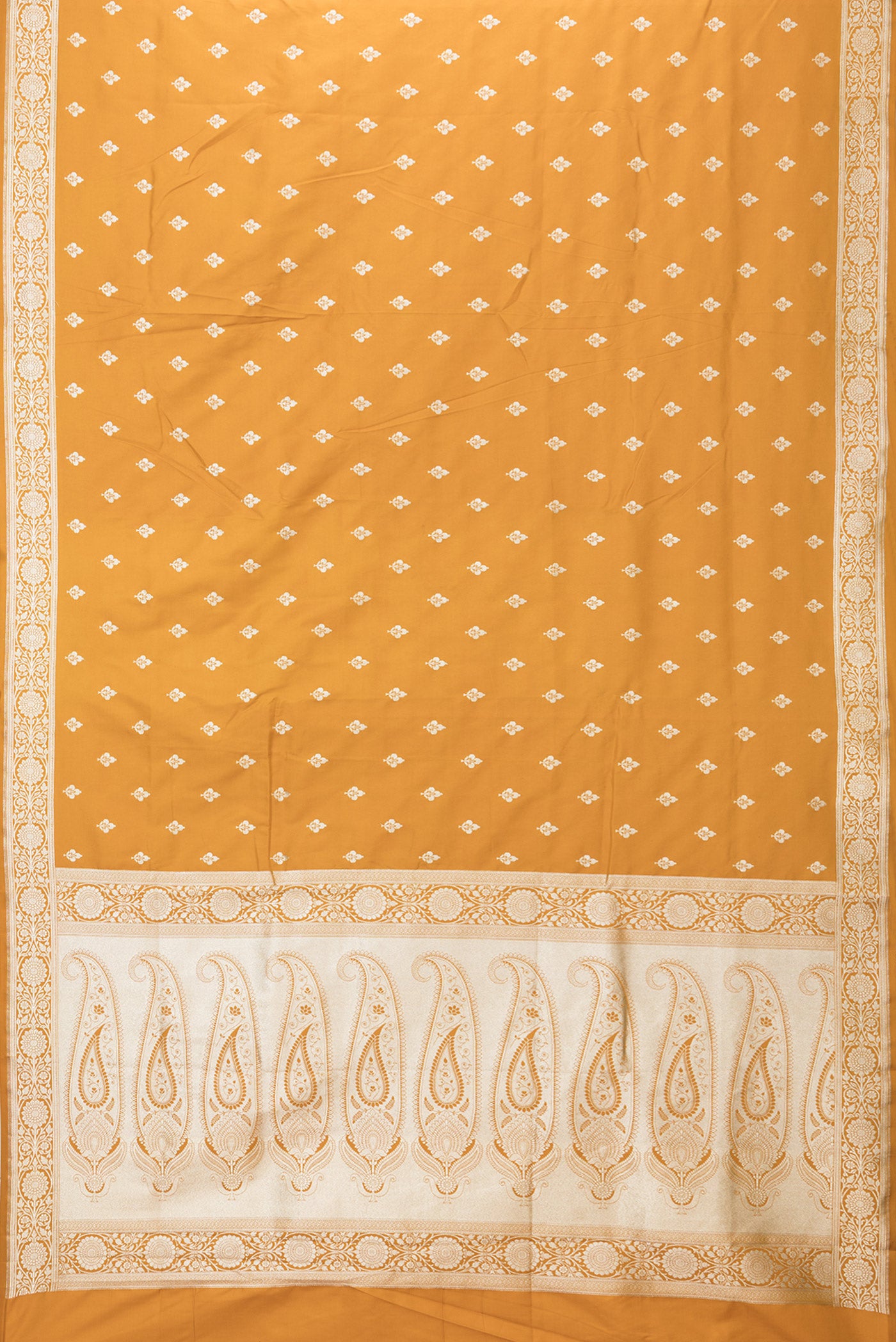 Flat view of Mustard Blended Banarasi Silk Saree with Zari Butta on the body and Zari Border. 