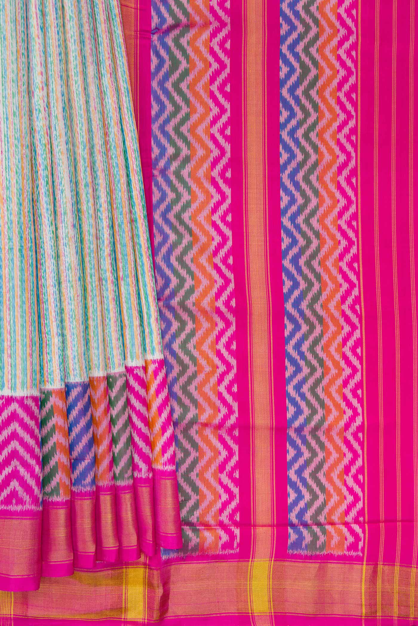 Pleats and pallu of Grey Dual Tone Rajkot Patola Silk Saree with Ikat Print on the body and Ikat Border