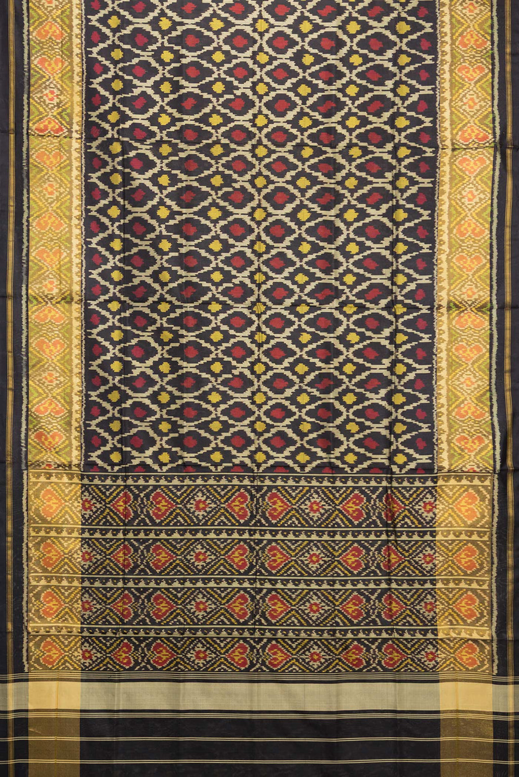 Flat view of Pure Silk Black Rajkot Patola Saree with Pure Ikat on the body and Ikat Border. 