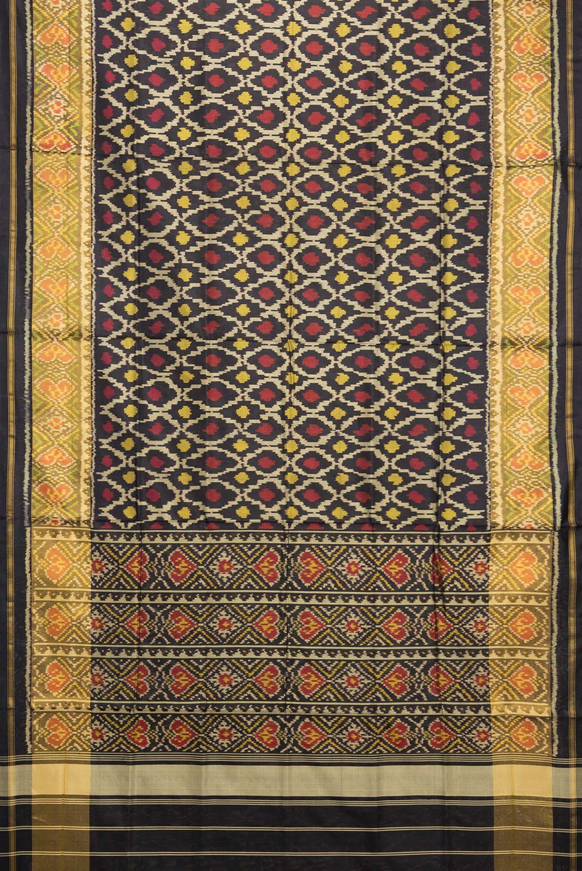 Flat view of Pure Silk Black Rajkot Patola Saree with Pure Ikat on the body and Ikat Border. 