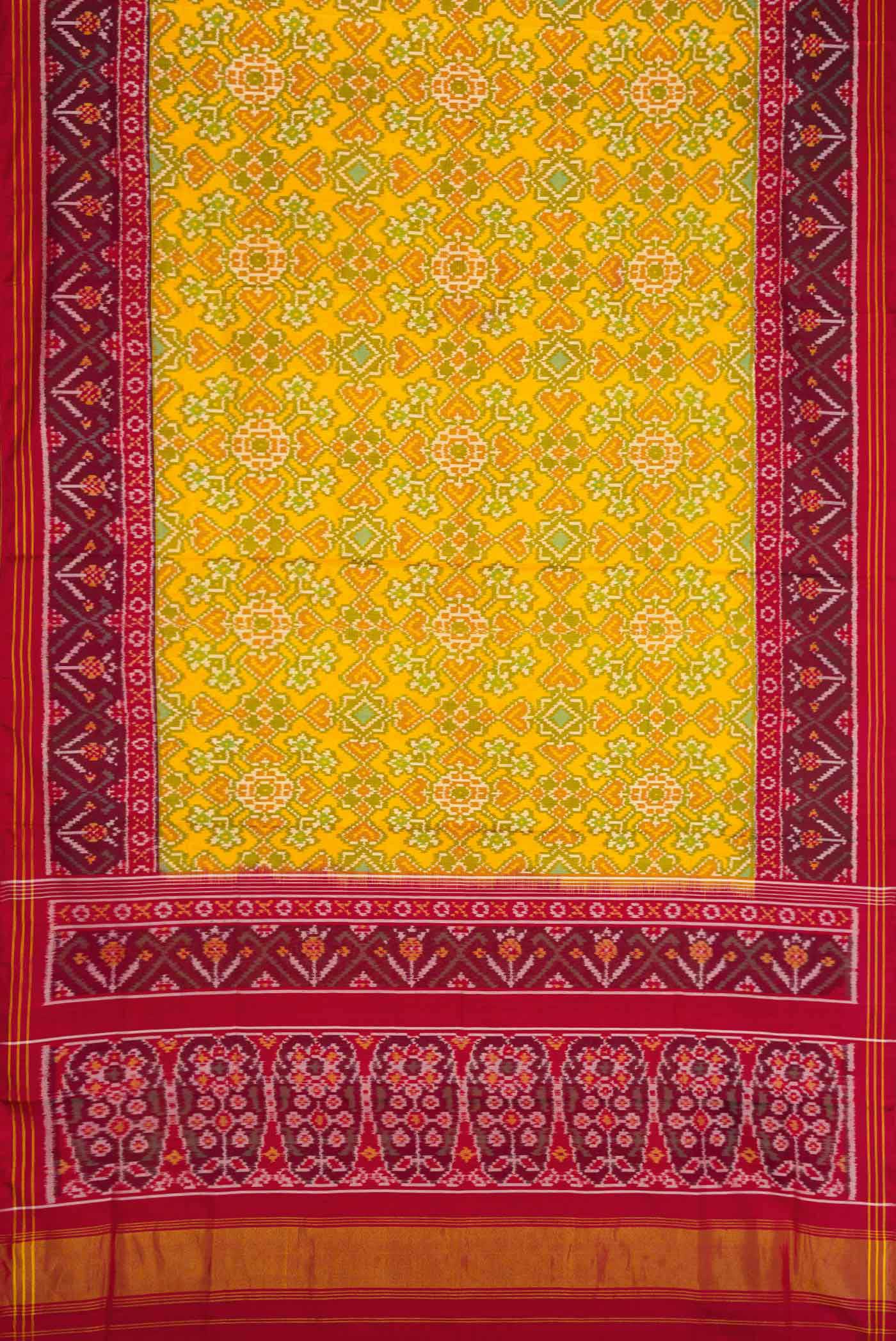 Flat view of Yellow Dual Tone Rajkot Patola Silk Saree with Ikat Print on the body and Ikat Border