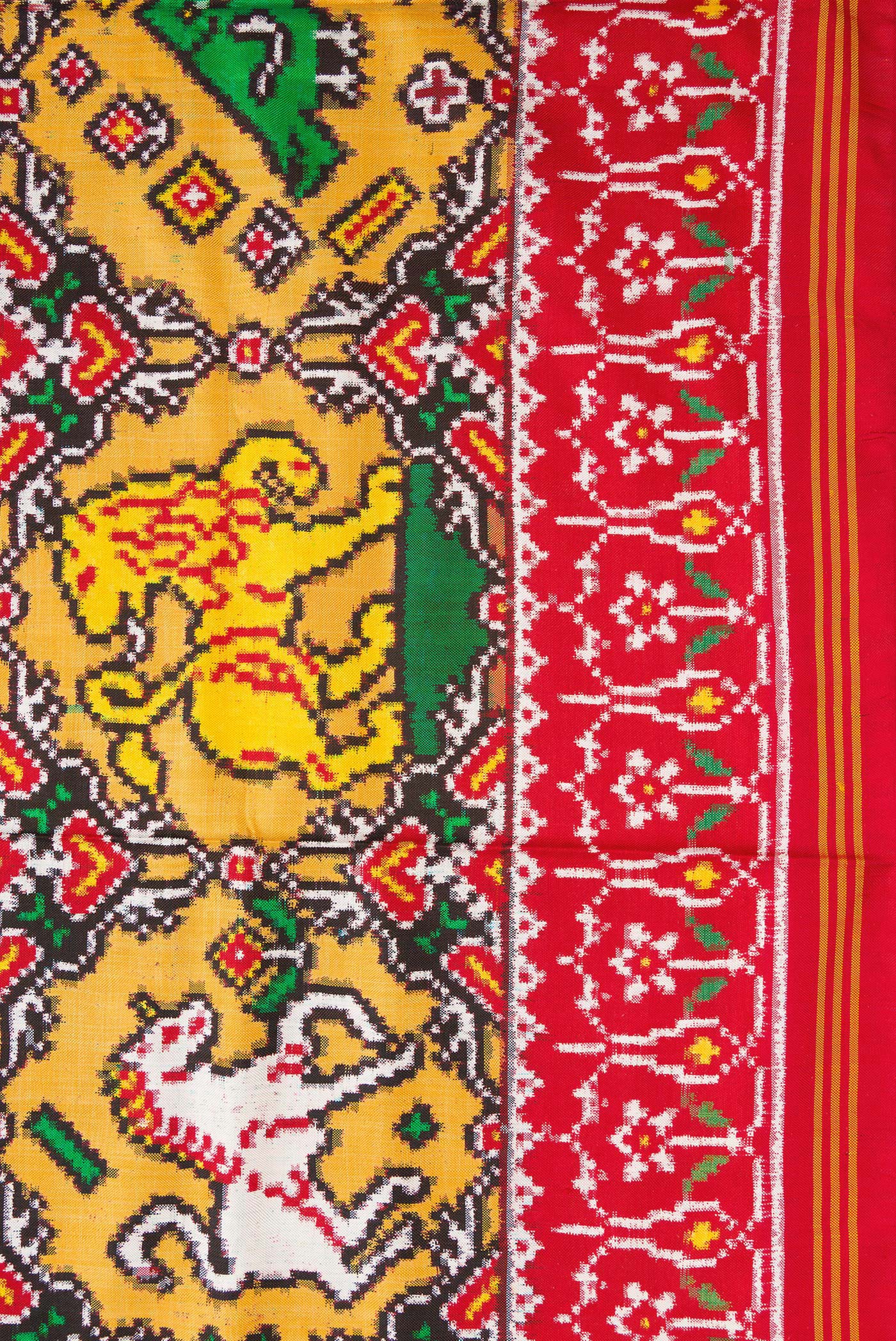 Border image of Mustard Dual Tone Double Ikat Saree with Ikat Print on the body and Ikat Border. 