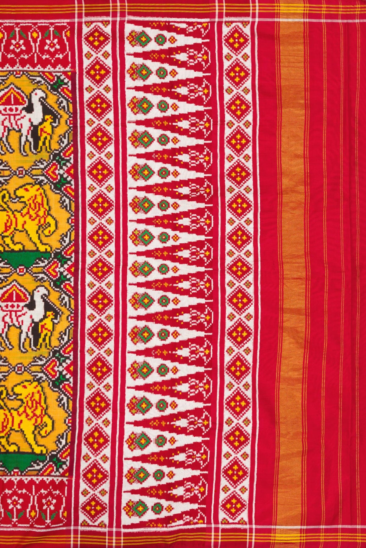 Close up image of the pallu of Mustard Dual Tone Double Ikat Saree with Ikat Print on the body and Ikat Border. 