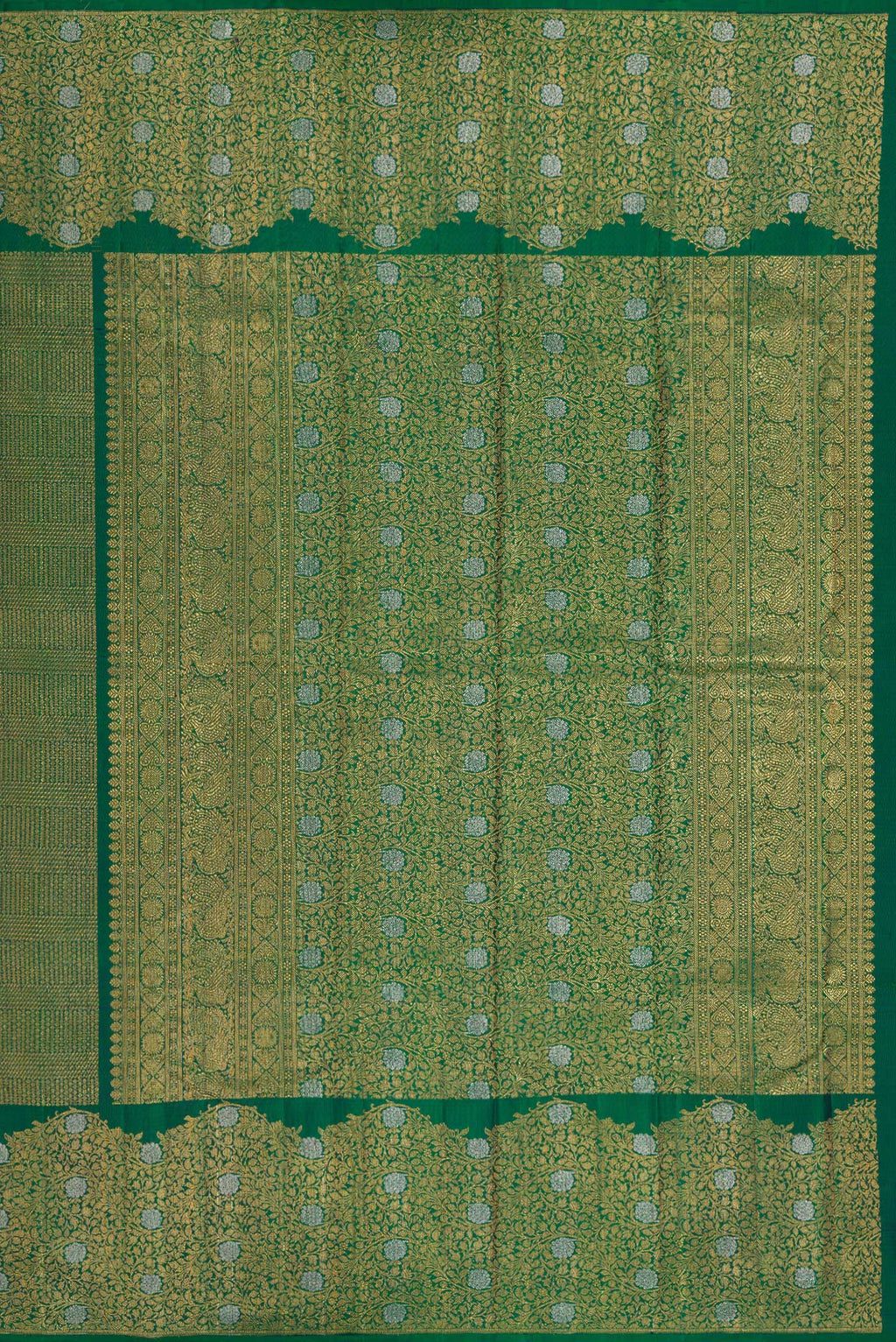 Close up image of the pallu of Bottle Green Kanchipuram Silk Saree with Zari Brocade on the body and Fancy Border. 