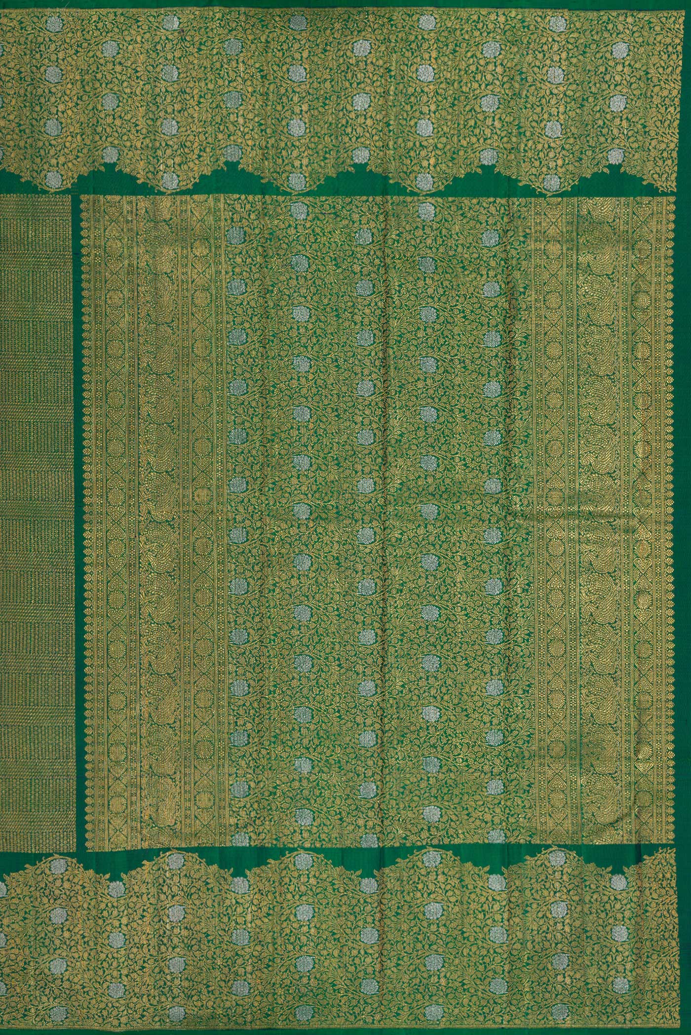 Close up image of the pallu of Bottle Green Kanchipuram Silk Saree with Zari Brocade on the body and Fancy Border. 