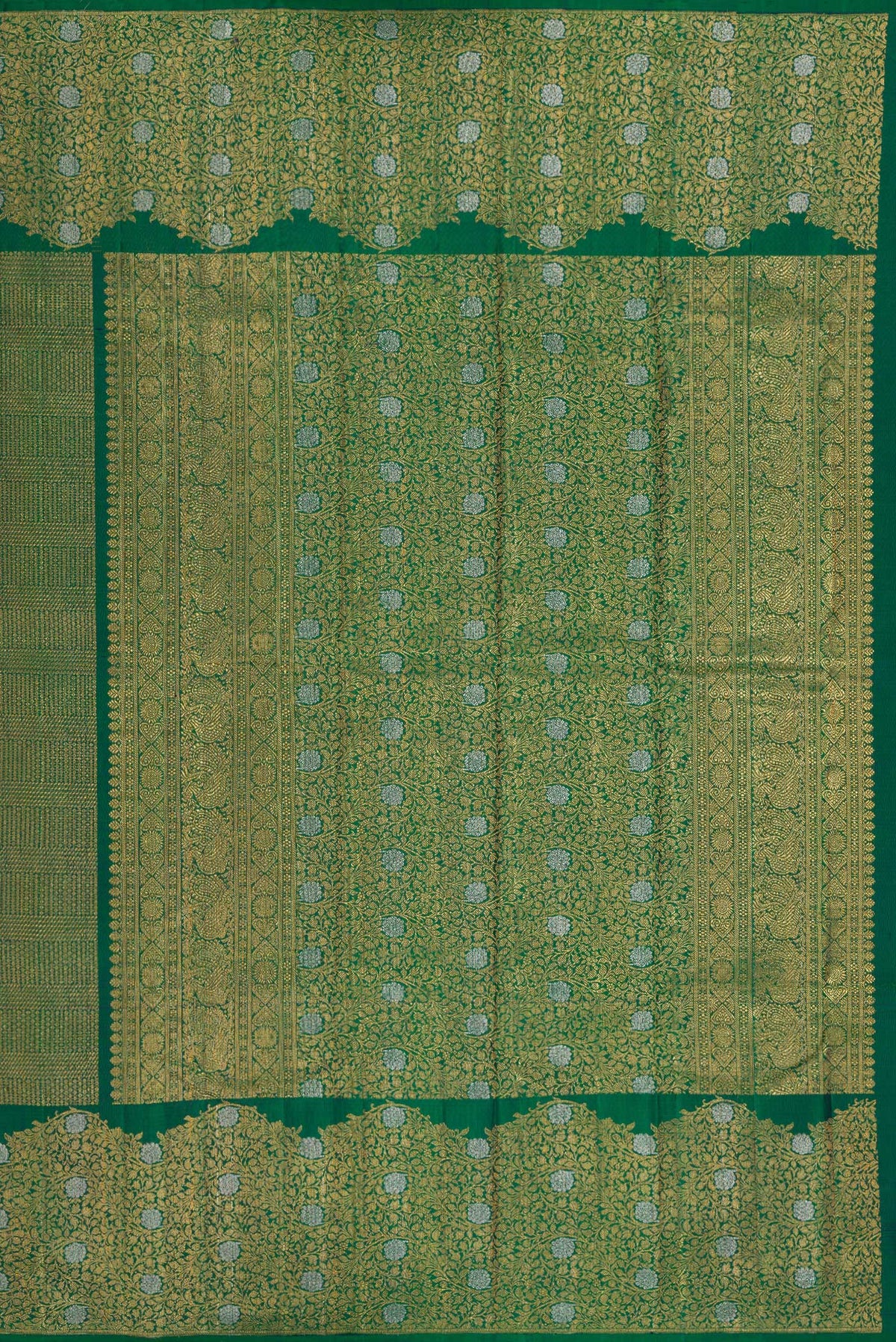Close up image of the pallu of Bottle Green Kanchipuram Silk Saree with Zari Brocade on the body and Fancy Border. 