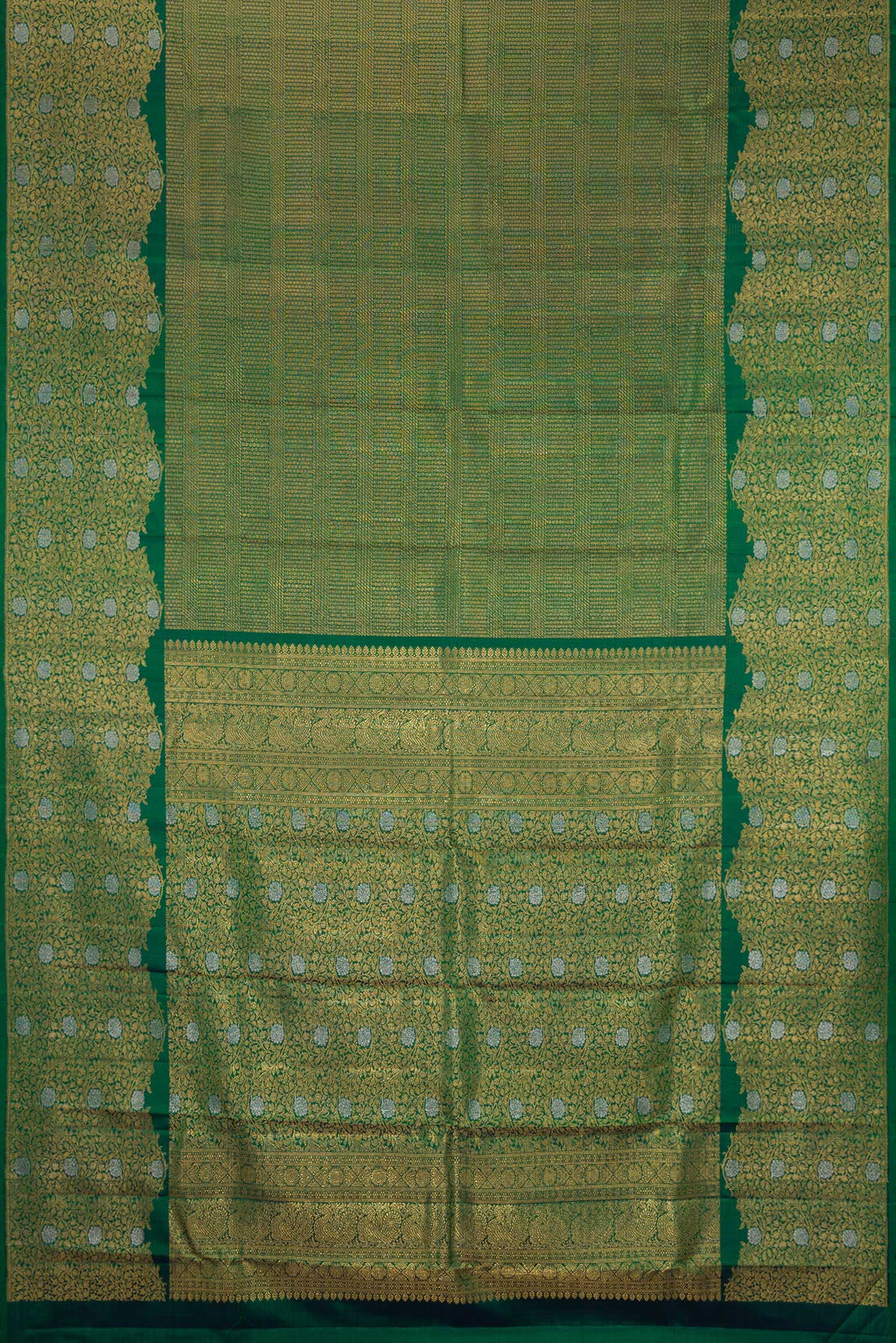 Flat view of Bottle Green Kanchipuram Silk Saree with Zari Brocade on the body and Fancy Border. 
