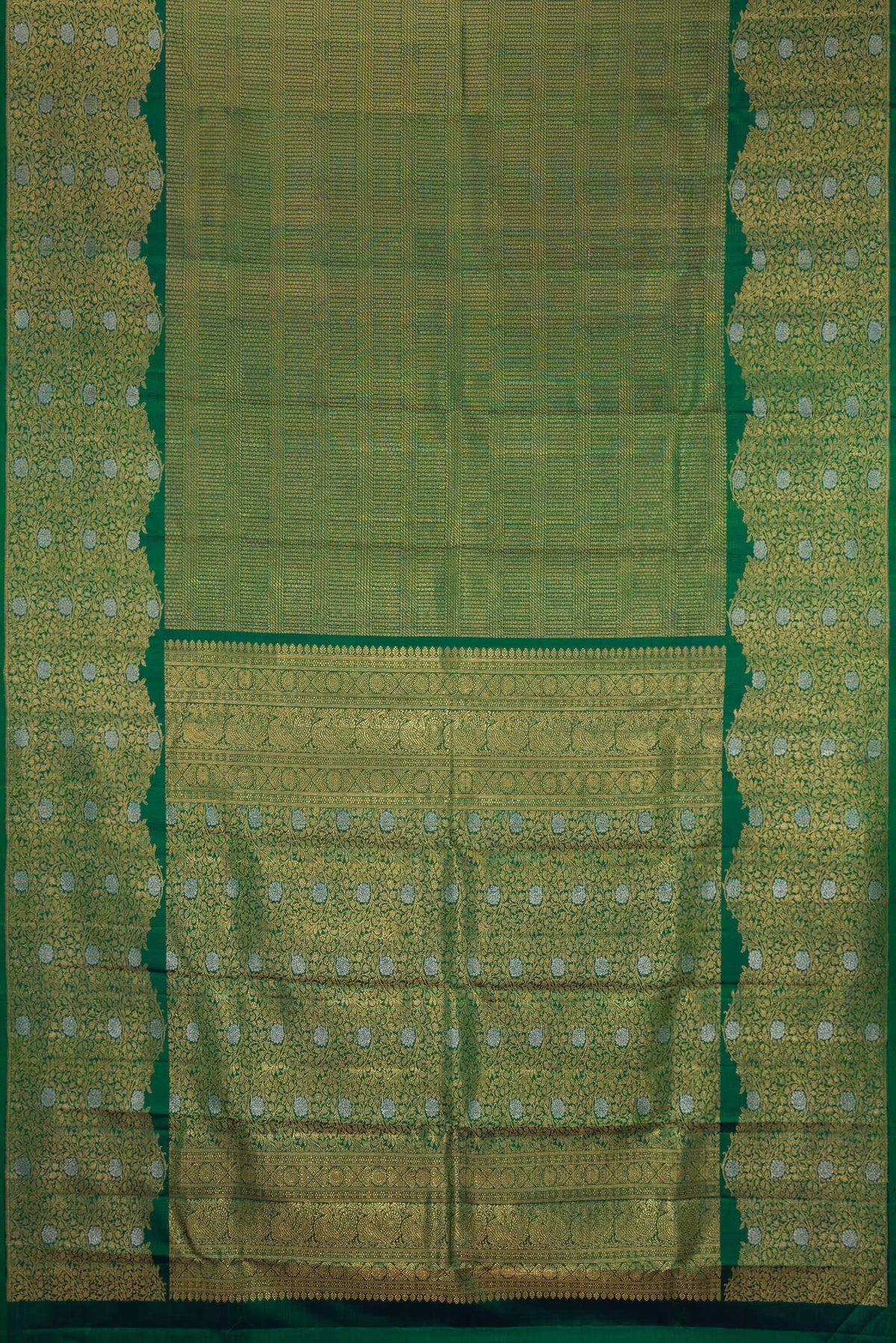 Flat view of Bottle Green Kanchipuram Silk Saree with Zari Brocade on the body and Fancy Border. 