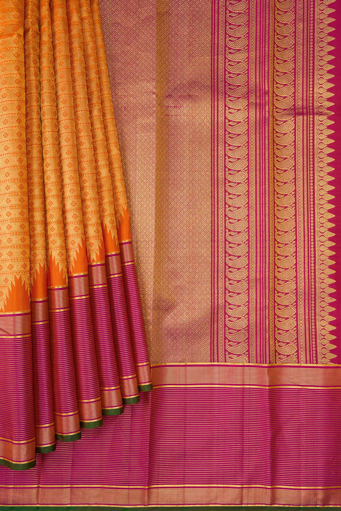 Pleats and pallu of Orange Kanjivaram Silk Saree with Zari Brocade on the body and Zari Border. 