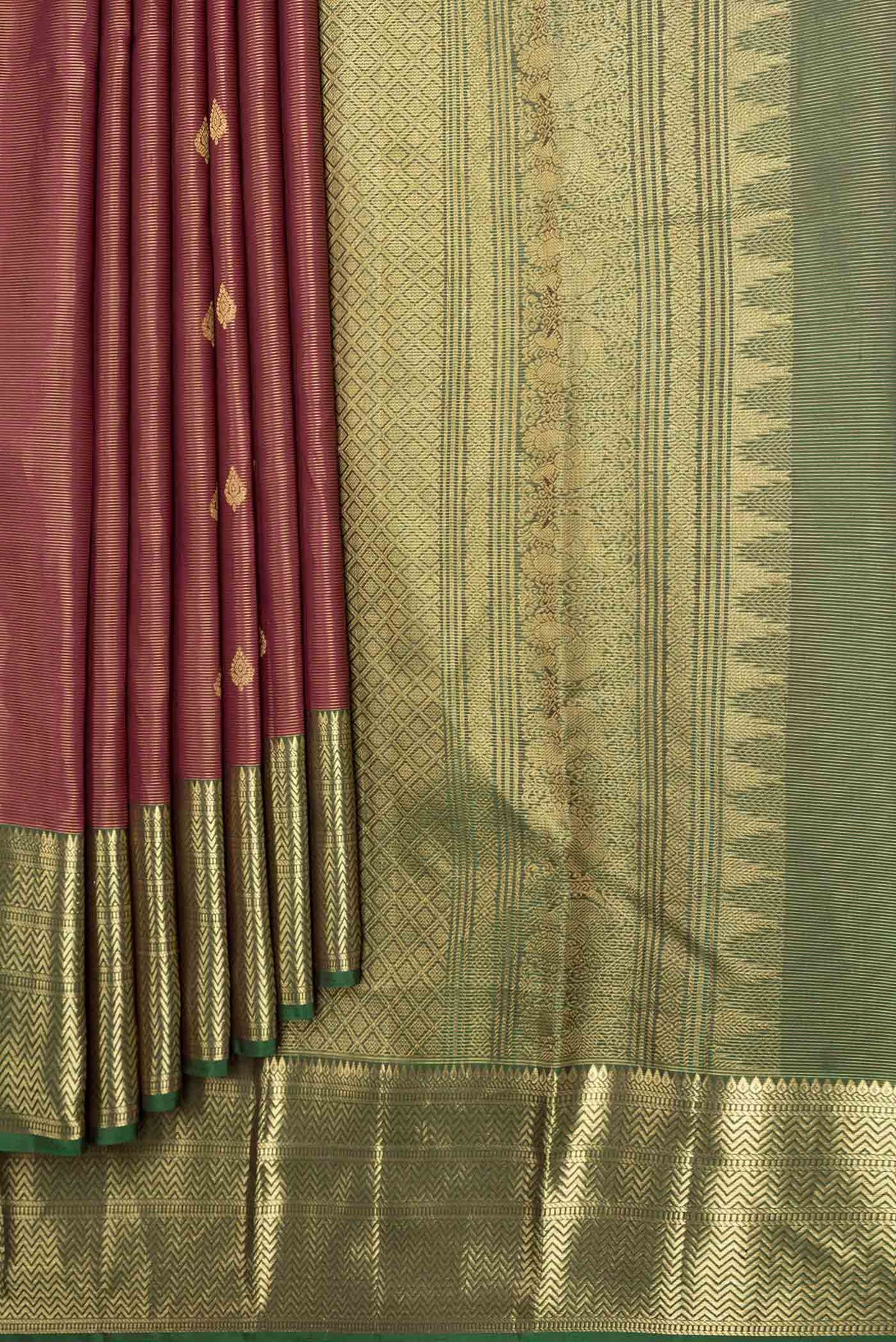 Pleats and pallu of Maroon Dual Tone Kanchipuram Saree with Stripes on the body and Zari Border