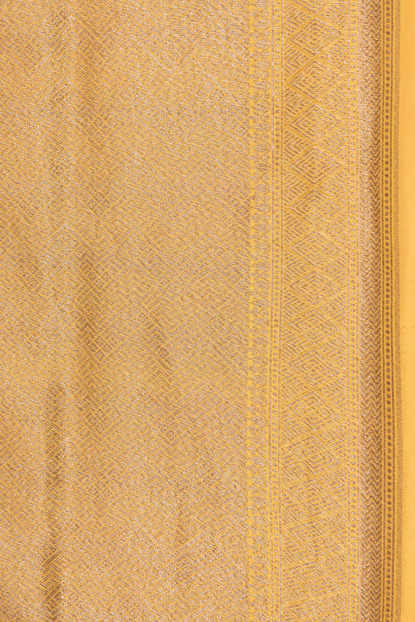 Border image of Yellow Dual Tone Banarasi Silk Saree with Zari Brocade on the body and Zari Border. 