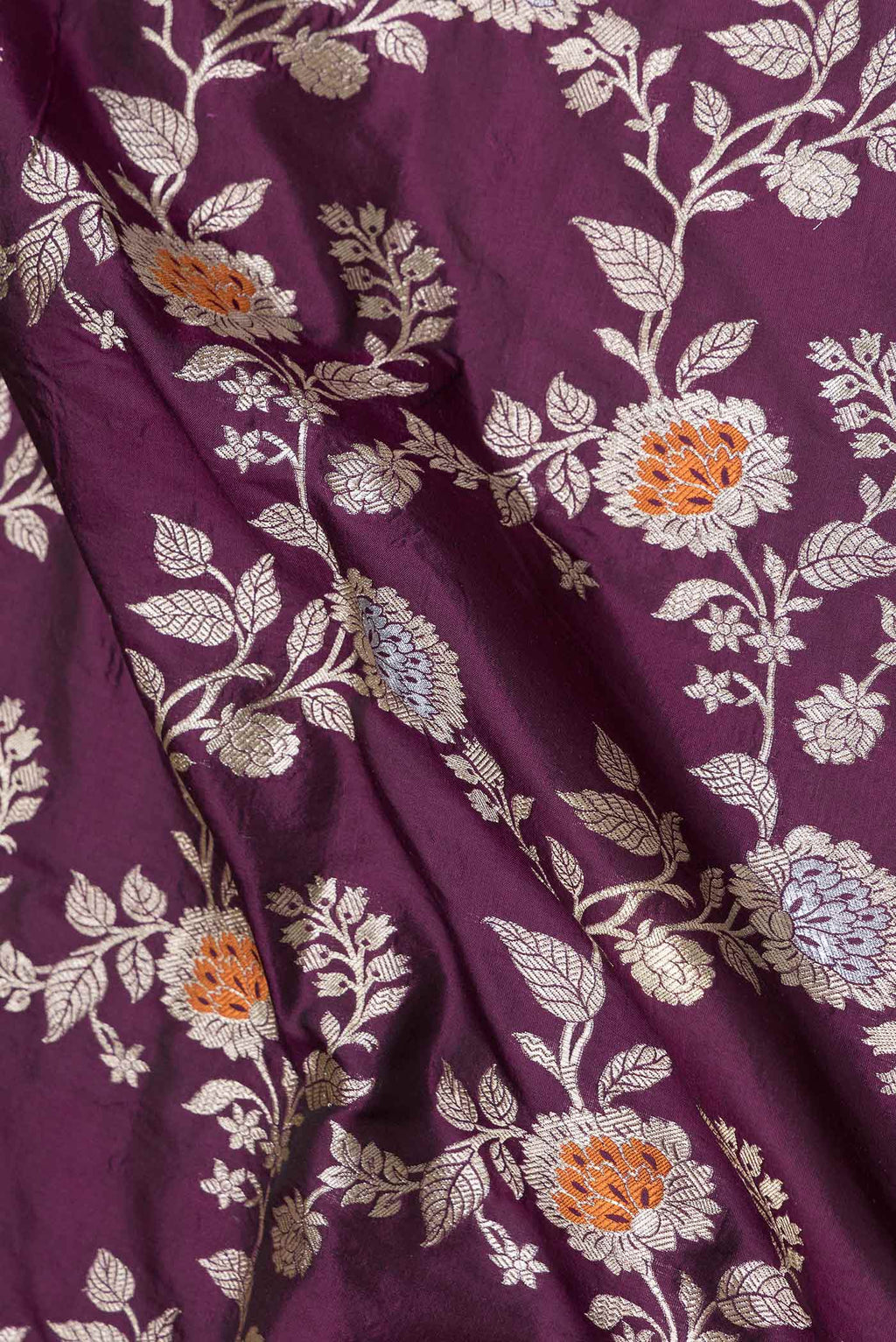 Close up of Purple Banarasi Silk Saree with Zari Brocade on the body and Zari Border displaying folds
