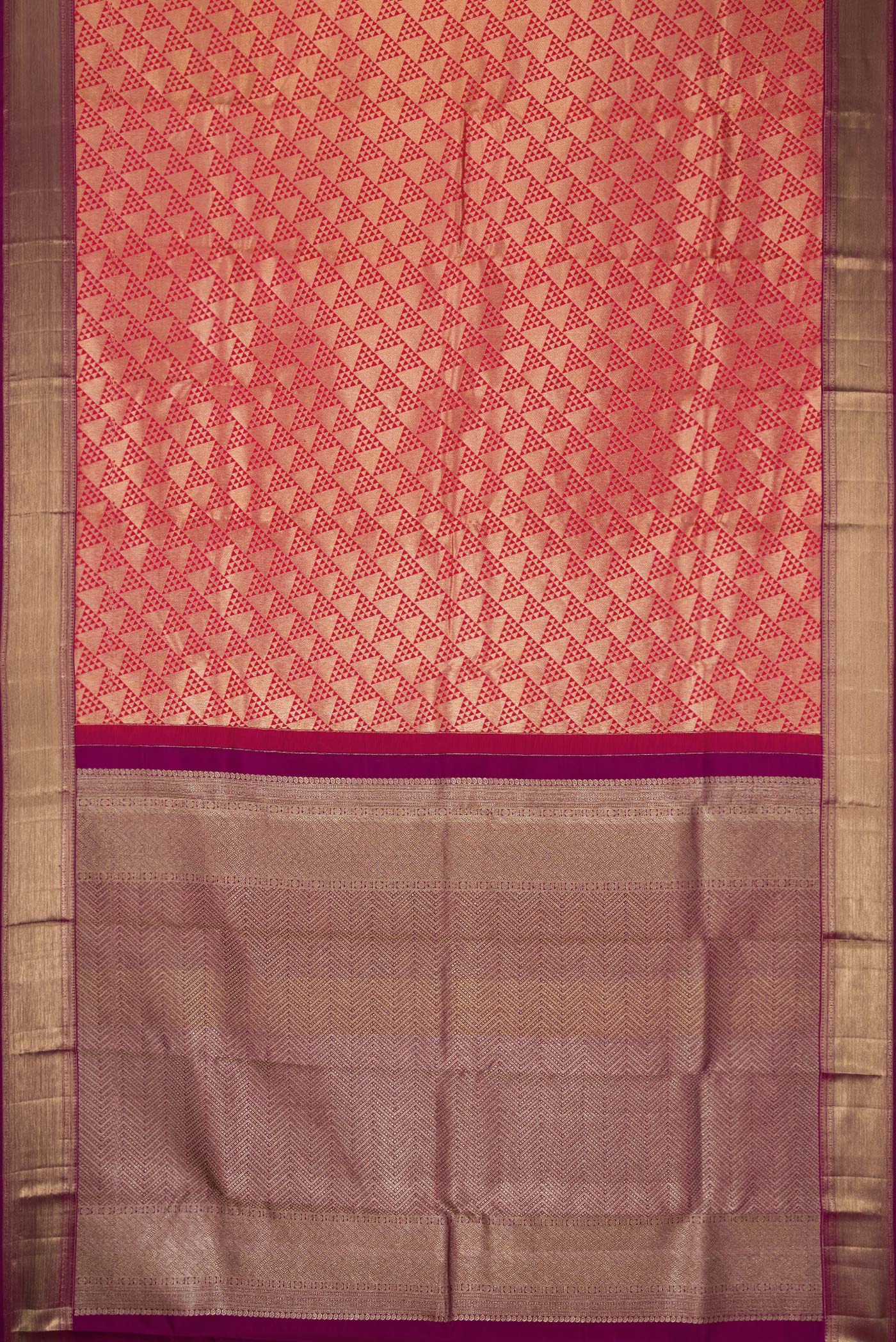 Flat view of Red Dual Tone Kanchipuram Silk Saree with Zari Brocade on the body and Zari Border. 