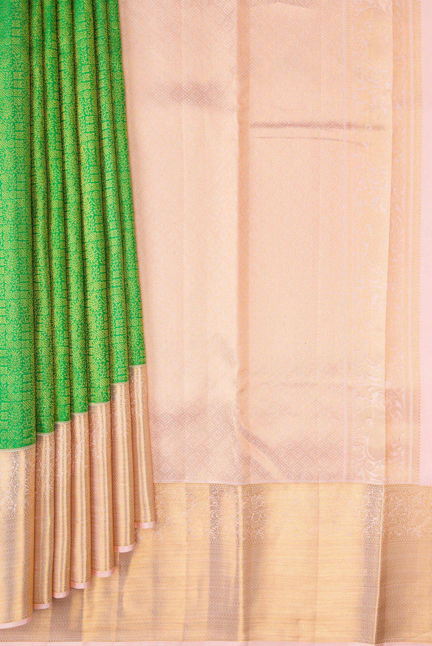 Pleats and pallu of Parrot Green Dual Tone Kanchipuram Silk Saree with Zari Brocade on the body and Zari Border. 