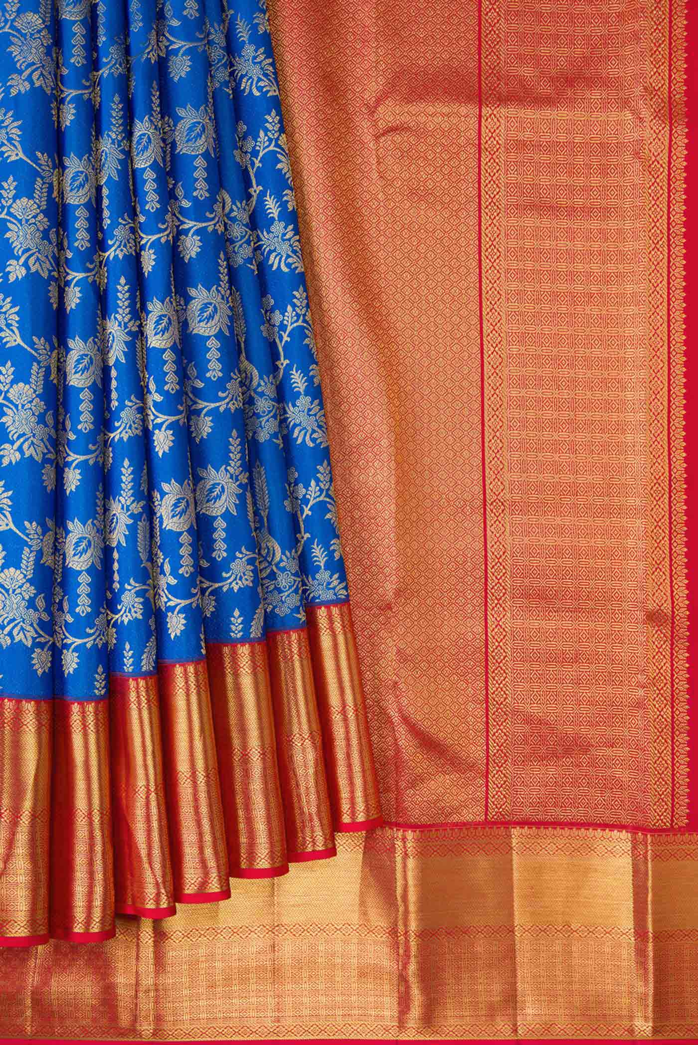 Pleats and pallu of Royal Blue Dual Tone Kanchipuram Silk Saree with Zari Brocade on the body and Zari Border. 