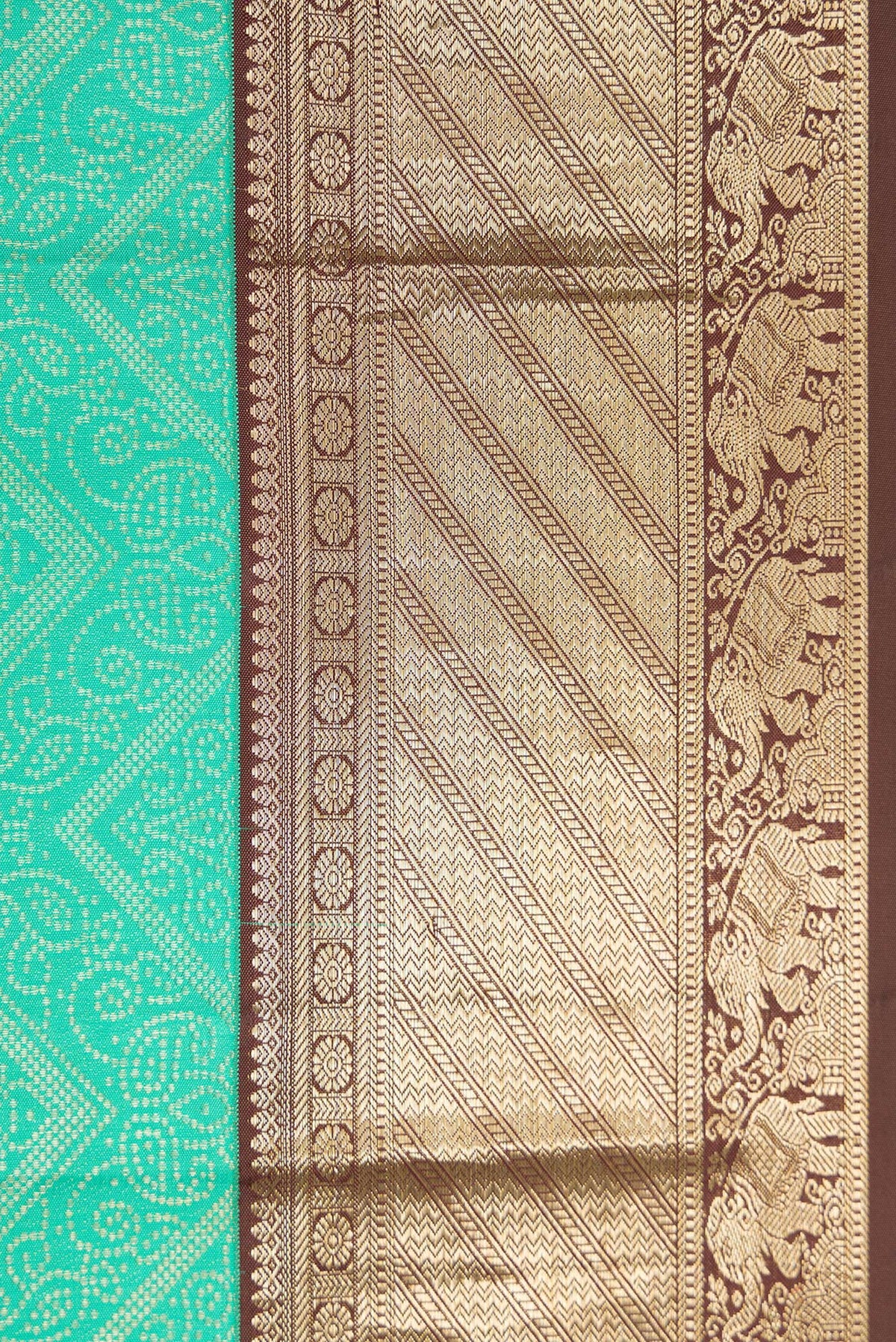 Border image of Sea Green Dual Tone Kanjivaram Silk Saree with Zari Brocade on the body and Zari Border. 